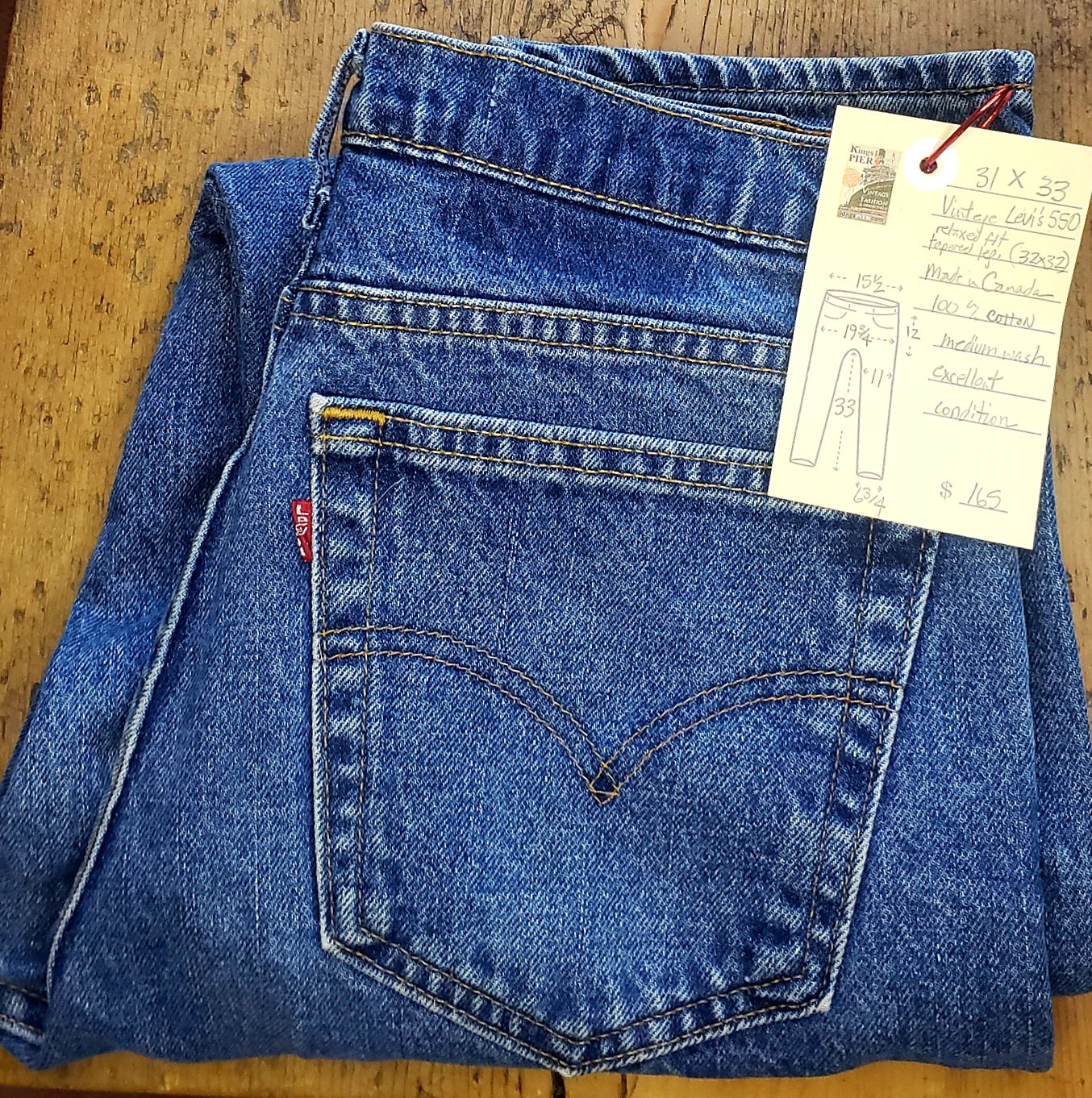 Vintage Levi's 521 31"x33" (tag size 32/32) high rise tapered leg Vintage Red Tab Made in CANADA 100% cotton Excellent condition button stamped # 217