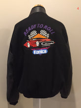 Load image into Gallery viewer, Kingspier Vintage - Konica “film and Cameras” wool and leather varsity jacket in black with snap closures, slash pockets, inside pocket and “get ready” written across the back with a race car illustration. Size large.
