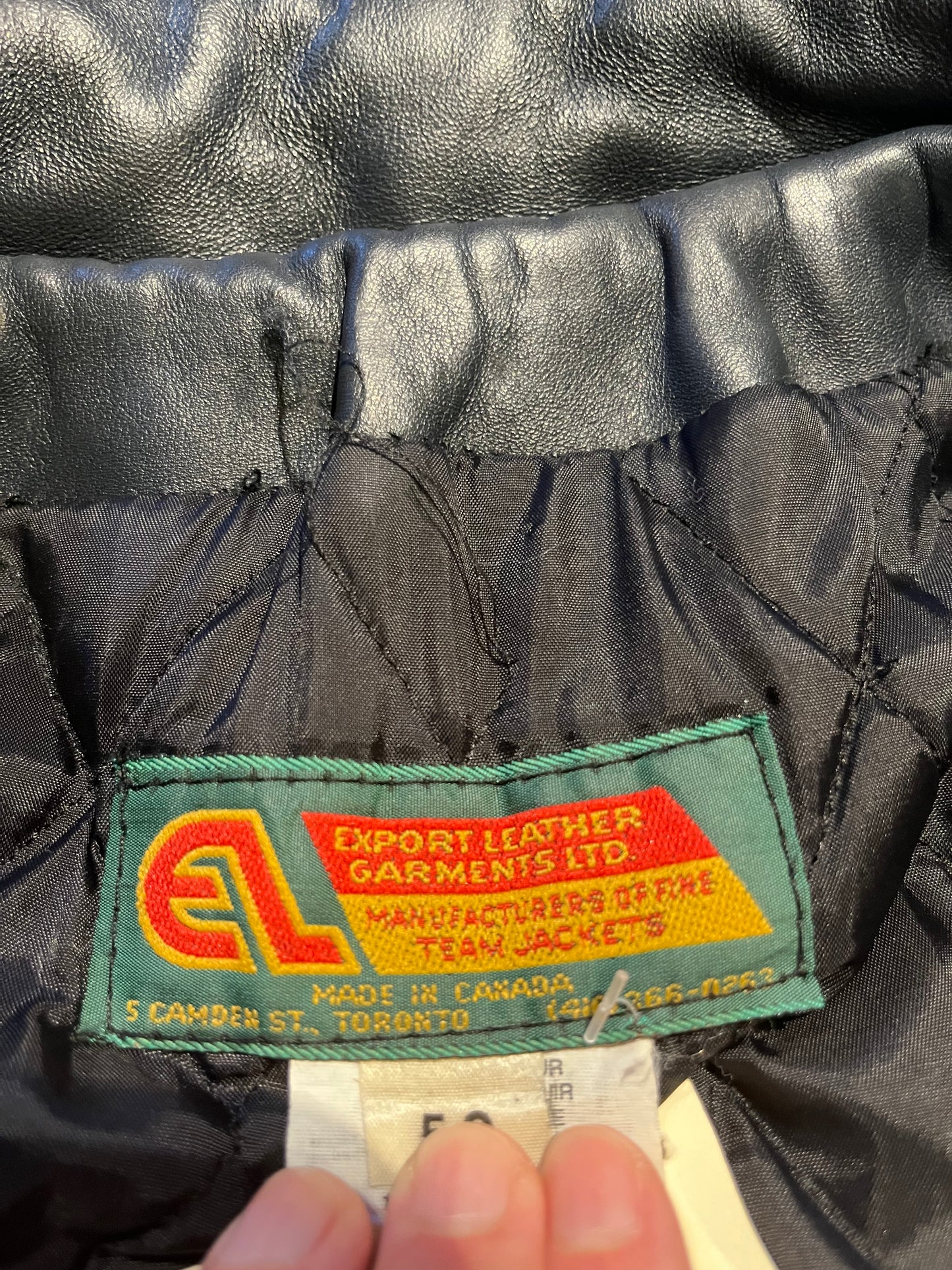 Vintage 70’s Waterloo Engineering Letterman’s leather varsity jacket by Export Leather Garments LTD.
Jacket features embroidered details on the chest, arms and back, two front pockets, zipper and snap closures and a quilted lining.
Made in Canada.
Size 52.
