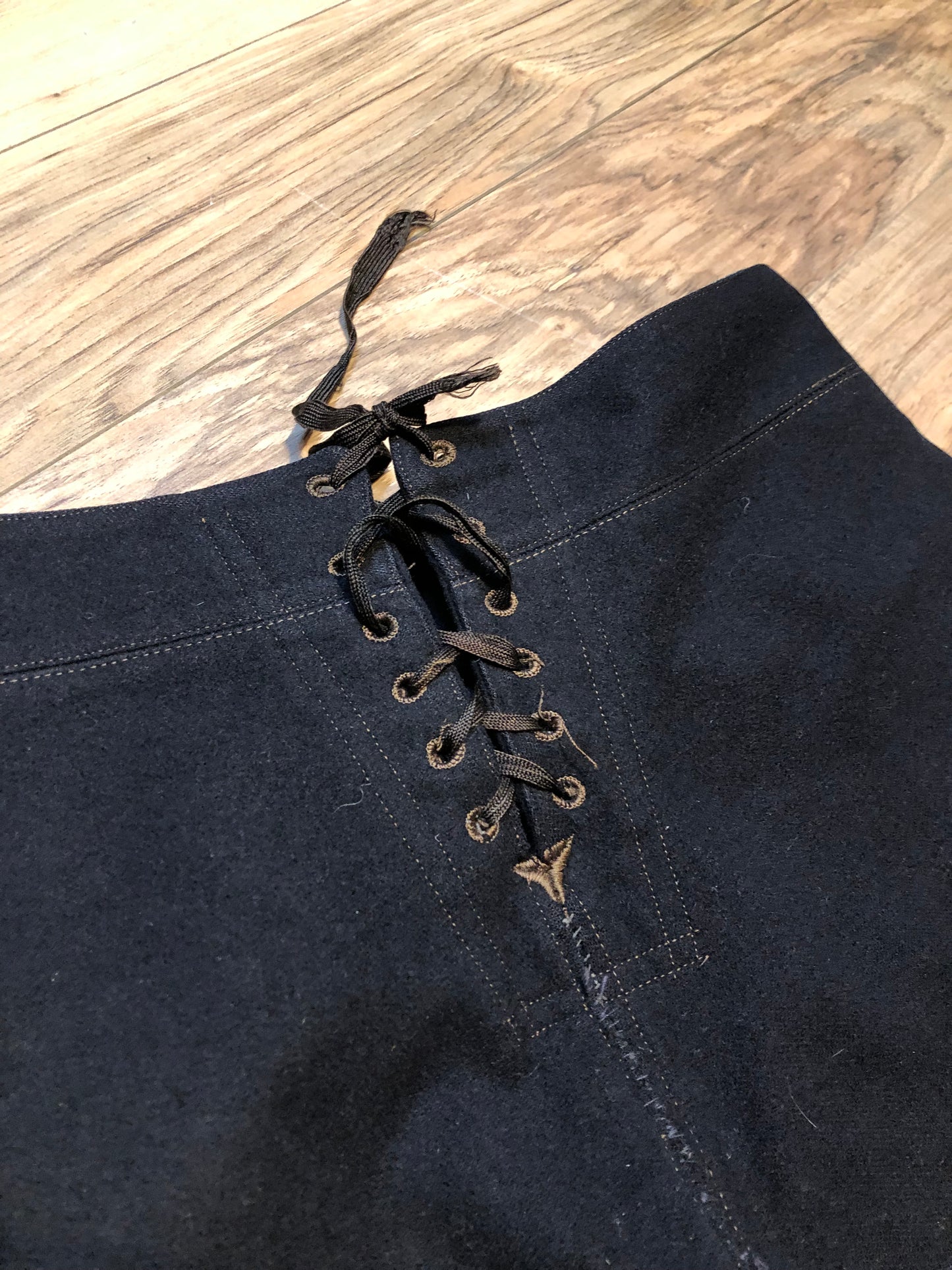 Kingspier Vintage - Vintage US Naval Clothing Factory very rare cracker jack pants with lace up closure in the back and button up front flap, “Boo Laundry” is written on the inside pocket.
Made in USA.