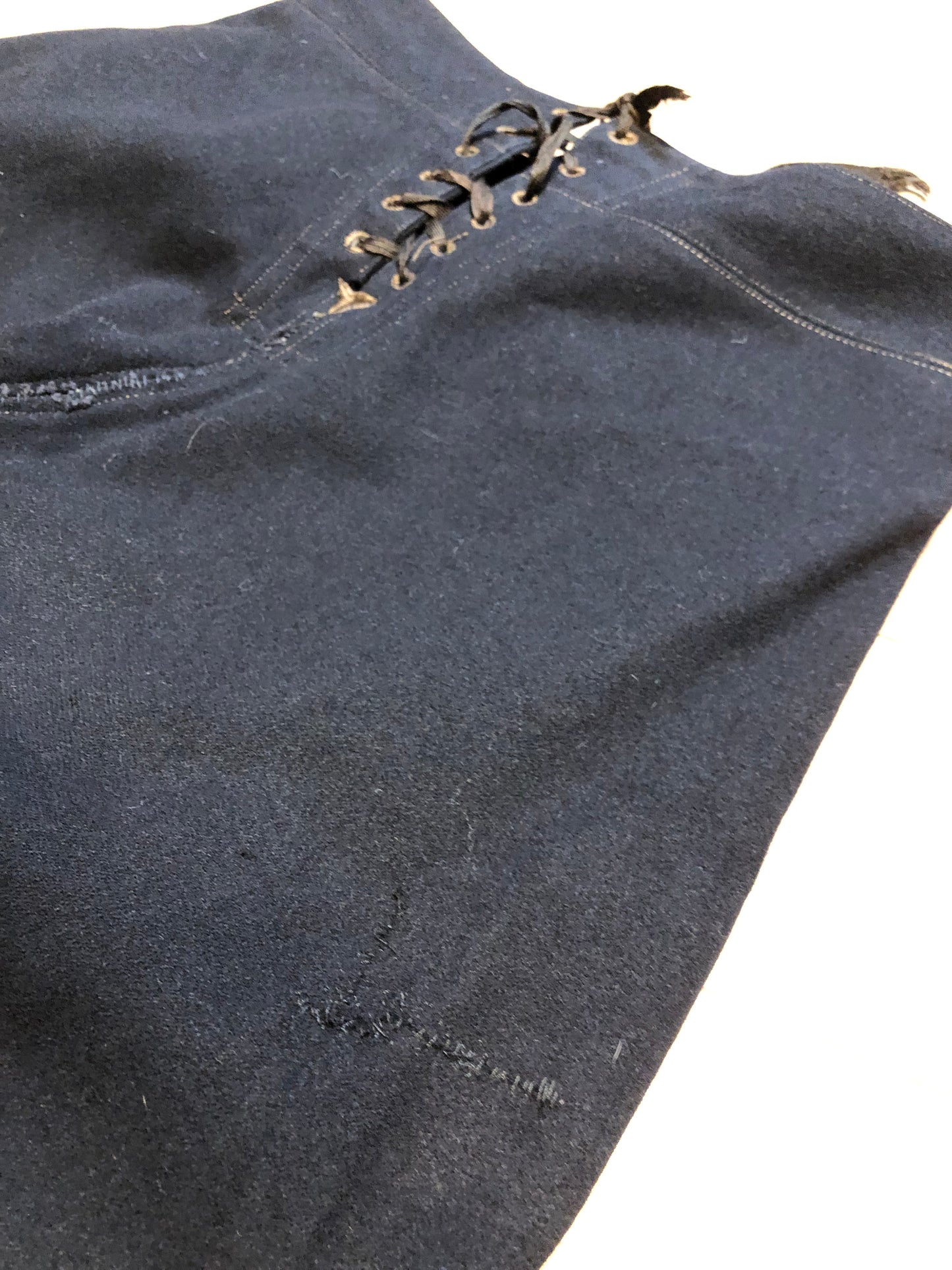 Kingspier Vintage - Vintage US Naval Clothing Factory very rare cracker jack pants with lace up closure in the back and button up front flap, “Boo Laundry” is written on the inside pocket.
Made in USA.