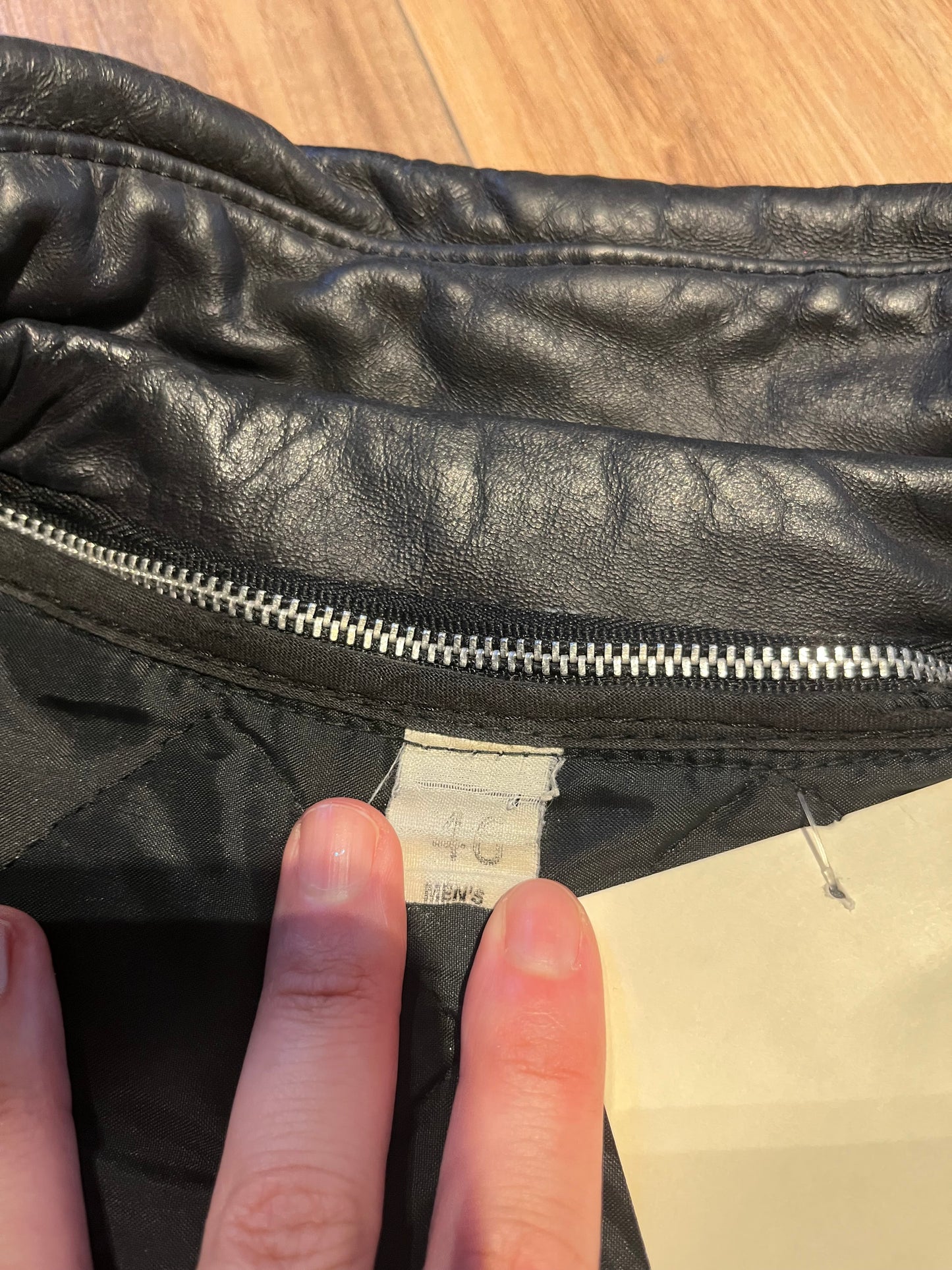 Vintage University of Toronto 1998 English Department Leather Varsity Jacket.
Jacket features embroidered details on the chest, arms and back, two front pockets, zipper and snap closures and a zip out quilted lining.
Size 46.