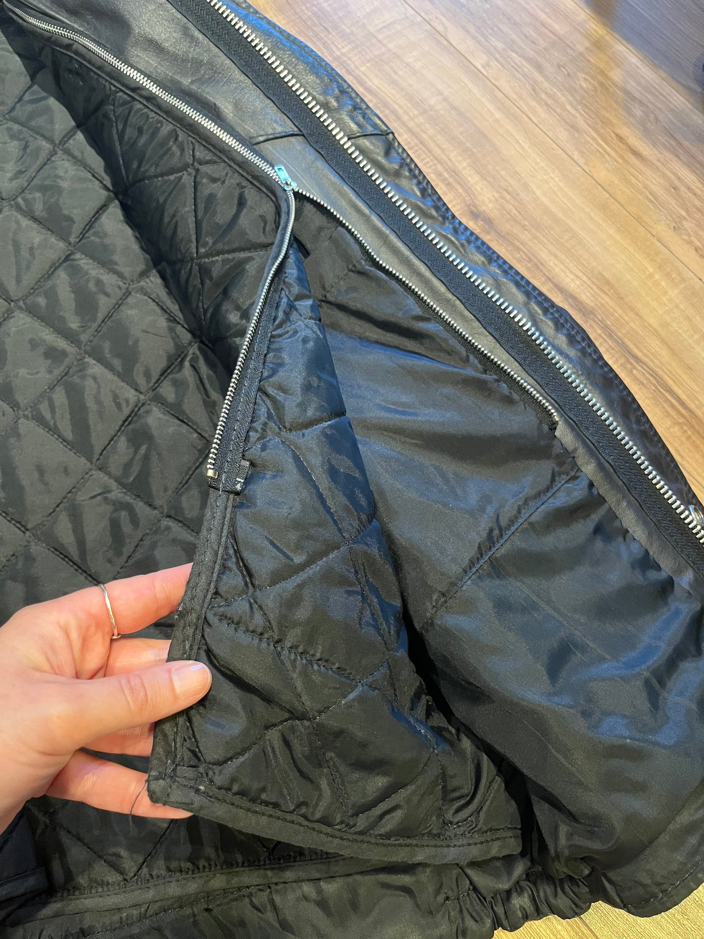 Vintage University of Toronto 1998 English Department Leather Varsity Jacket.
Jacket features embroidered details on the chest, arms and back, two front pockets, zipper and snap closures and a zip out quilted lining.
Size 46.