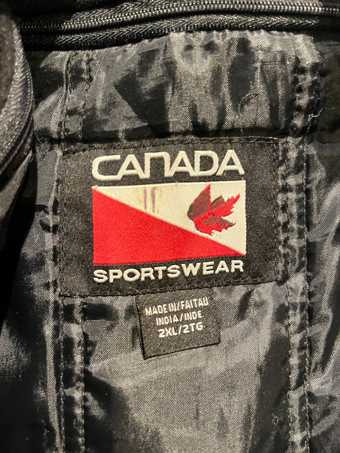 Vintage Vics BB Granby Hockey Varsity Jacket by Canada Sportswear.
Black mouton with leather sleeves, snap closures, two front pockets and a quilted lining.
Made in India.
Size 2XL.