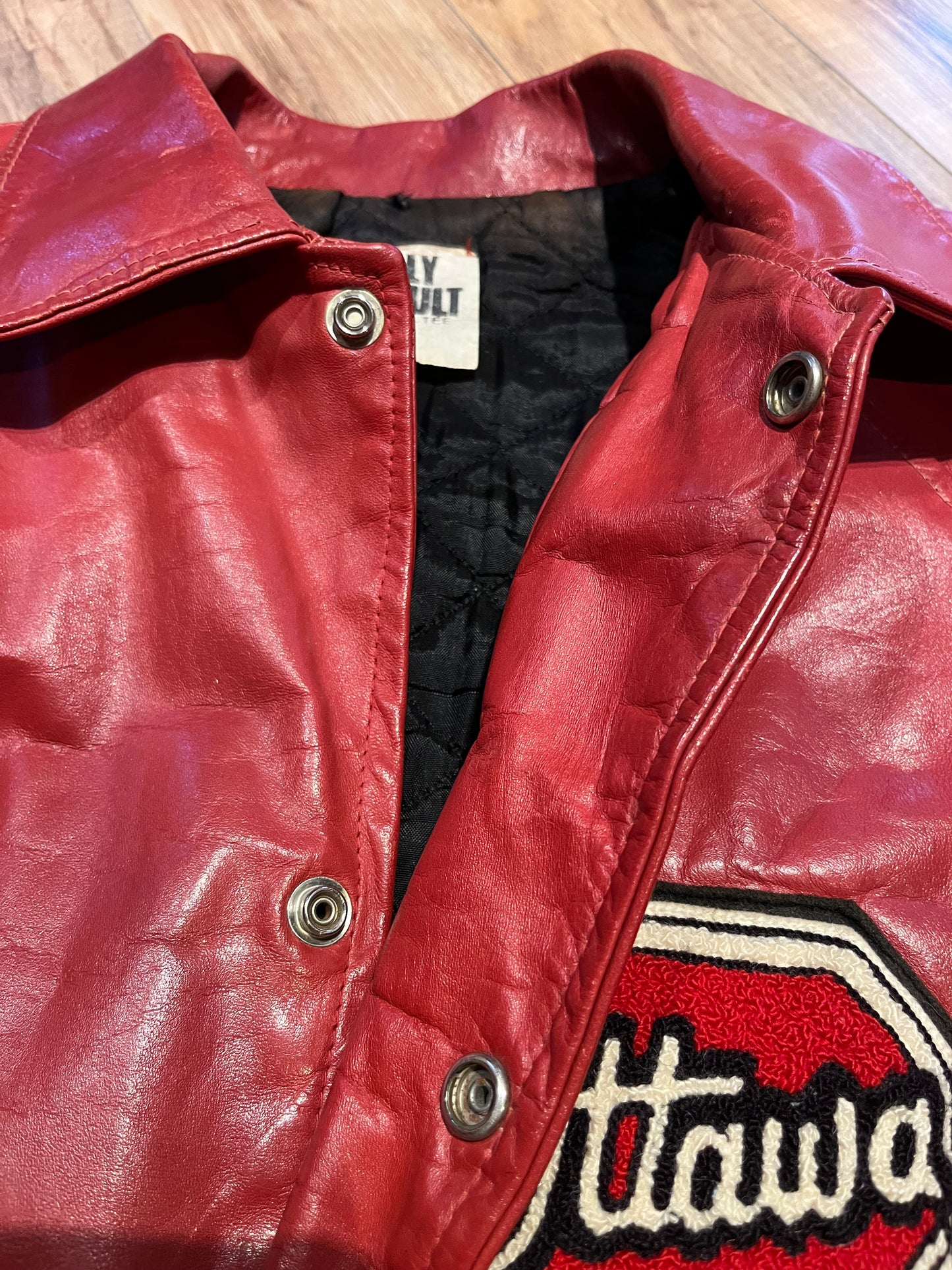 Vintage 70’s Ottawa 67s Red Leather Varsity Jacket by Rolly Sarault.
Jacket features embroidered details on the chest, snap closures, quilted lining and two front pockets.
Made in Canada.
Chest 46”.
