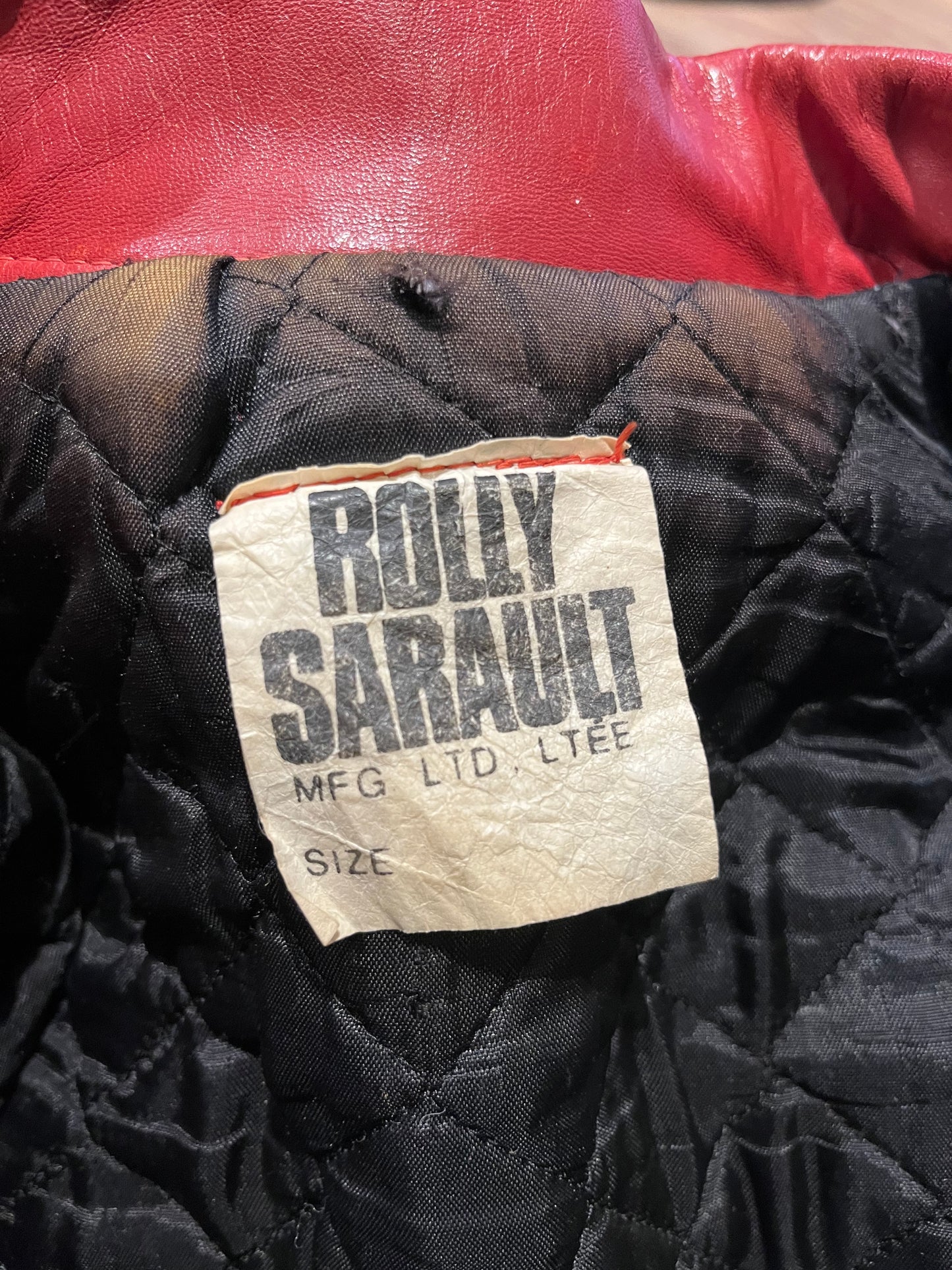 Vintage 70’s Ottawa 67s Red Leather Varsity Jacket by Rolly Sarault.
Jacket features embroidered details on the chest, snap closures, quilted lining and two front pockets.
Made in Canada.
Chest 46”.