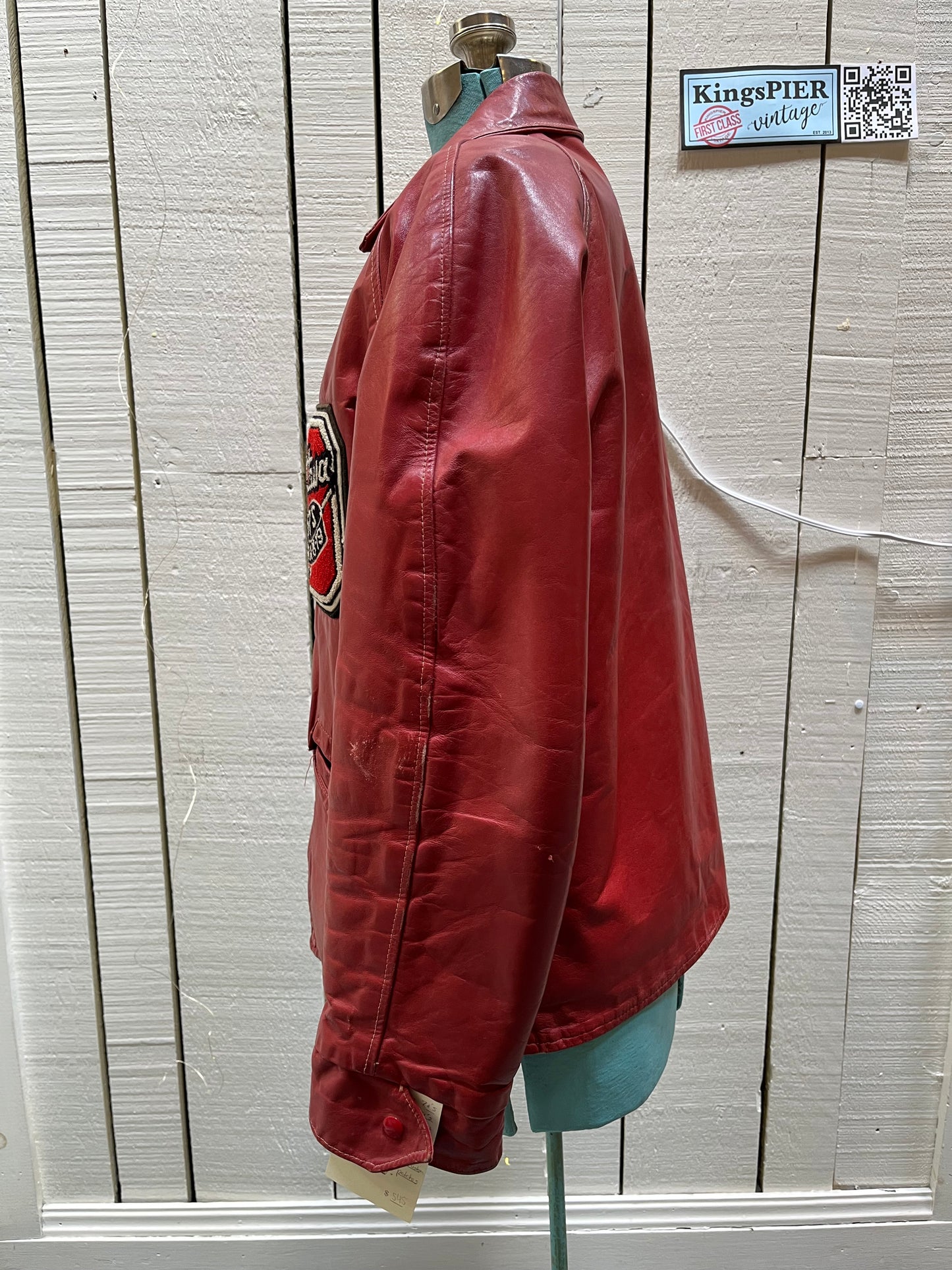 Vintage 70’s Ottawa 67s Red Leather Varsity Jacket by Rolly Sarault.
Jacket features embroidered details on the chest, snap closures, quilted lining and two front pockets.
Made in Canada.
Chest 46”.