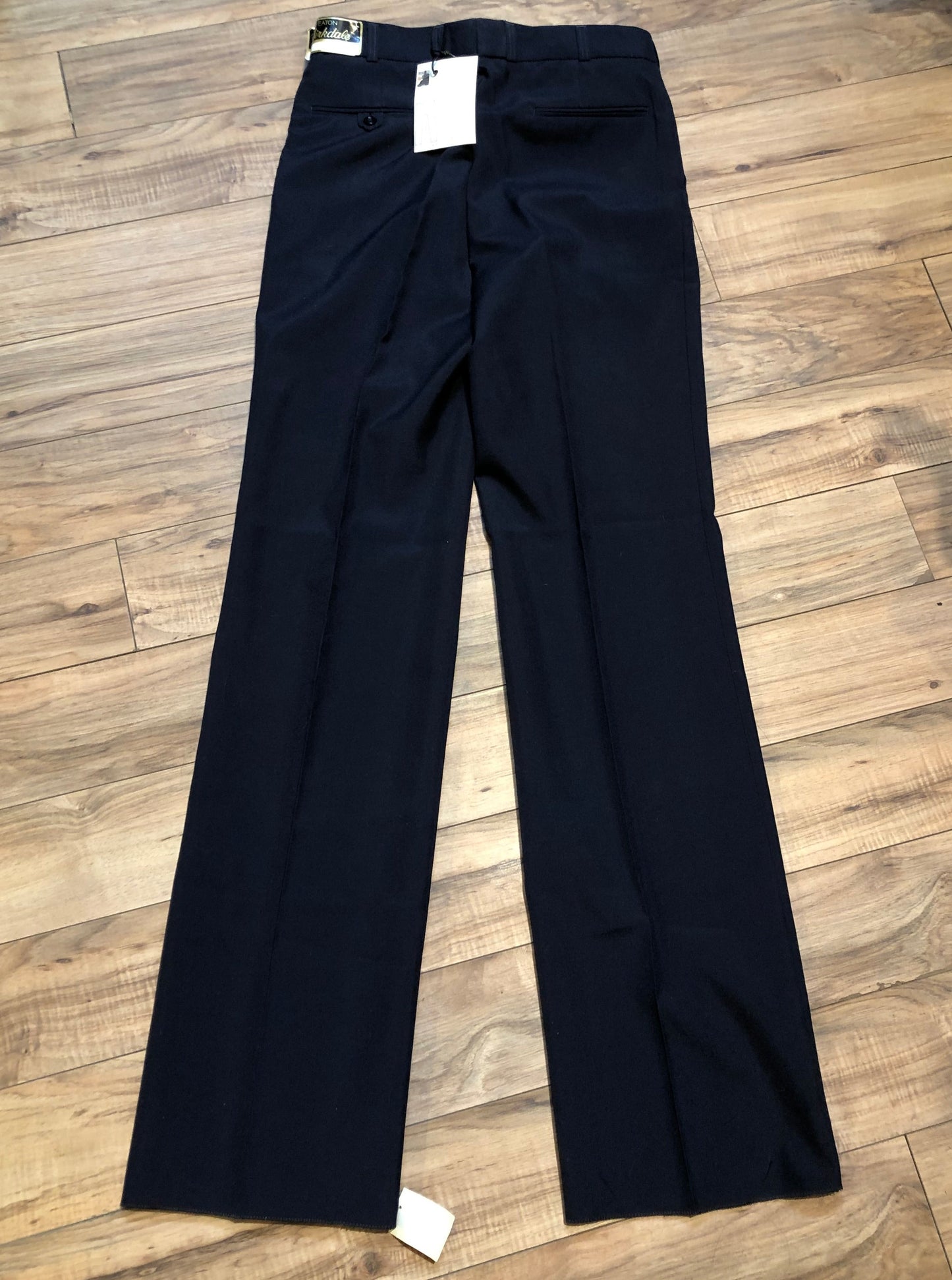 Kingspier Vintage - Vintage deadstock Eaton Birkdale 55% Polyester/ 45% wool dress pants with straight leg, mis rise, zip fly and front and back pockets.
Made in Czechoslovakia