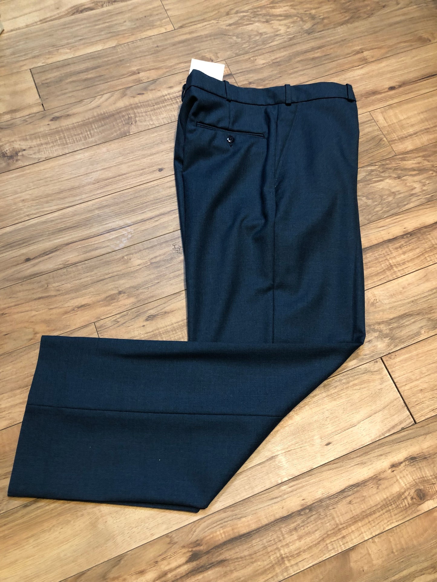Kingspier Vintage - Logistik blue wool blend (65% wool/ 35% polyester) heavy weight dress pants with zip fly, straight leg, mid rise and front and back pockets,
Made in Canada.