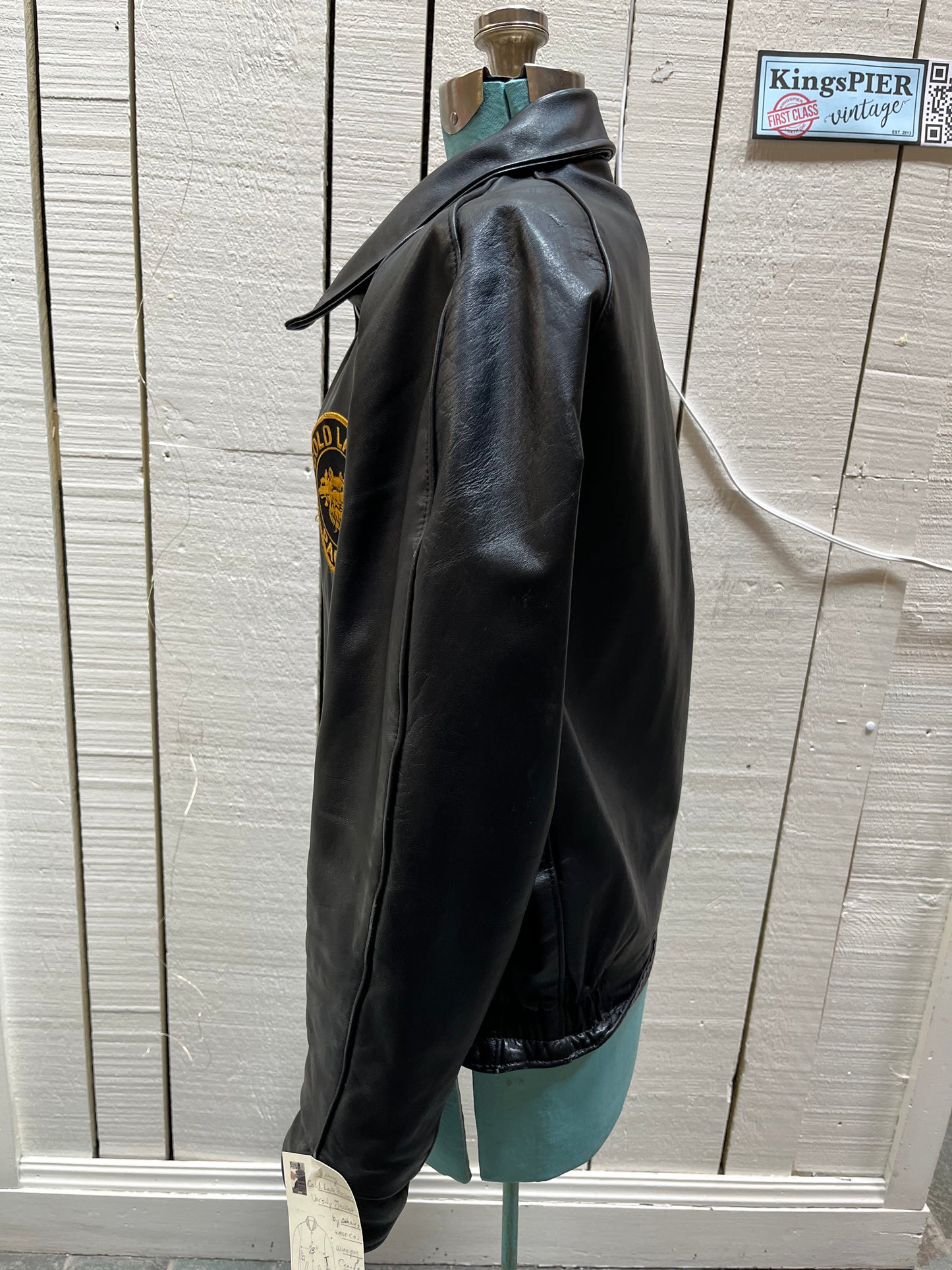 Vintage Cold Lake Packers Leather Varsity Jacket by Athletes Wear Co. LTD.
Jacket features embroidered detail on the chest, two front pockets and snap closures.
Made in Canada.
Chest 46”.