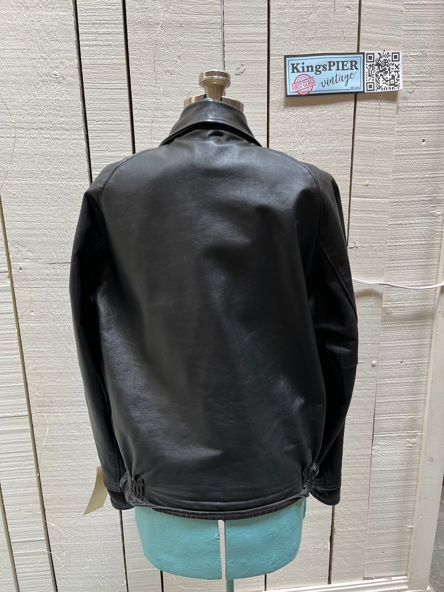 Vintage Cold Lake Packers Leather Varsity Jacket by Athletes Wear Co. LTD.
Jacket features embroidered detail on the chest, two front pockets and snap closures.
Made in Canada.
Chest 46”.