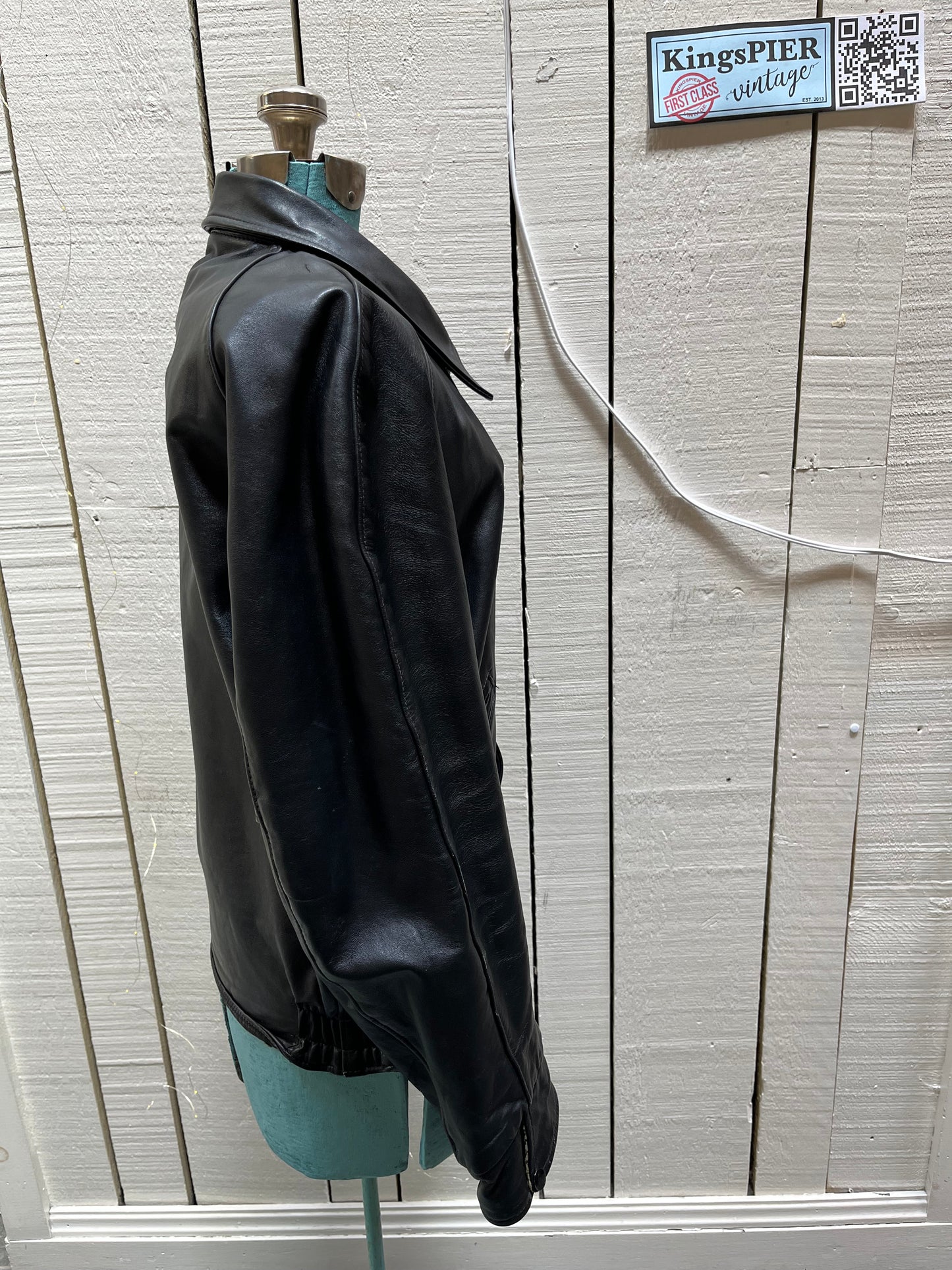 Vintage Cold Lake Packers Leather Varsity Jacket by Athletes Wear Co. LTD.
Jacket features embroidered detail on the chest, two front pockets and snap closures.
Made in Canada.
Chest 46”.
