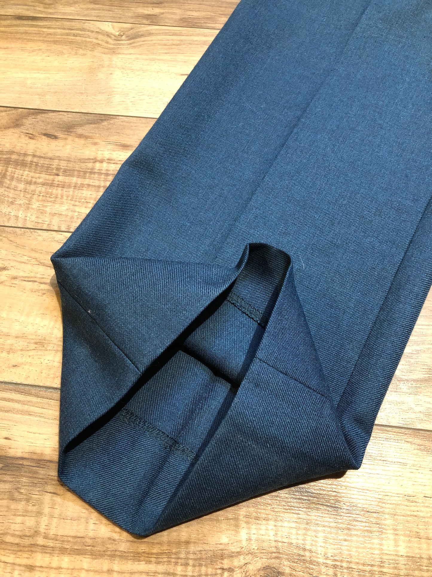Kingspier Vintage - Logistik blue wool blend (65% wool/ 35% polyester) heavy weight dress pants with zip fly, straight leg, mid rise and front and back pockets,
Made in Canada.