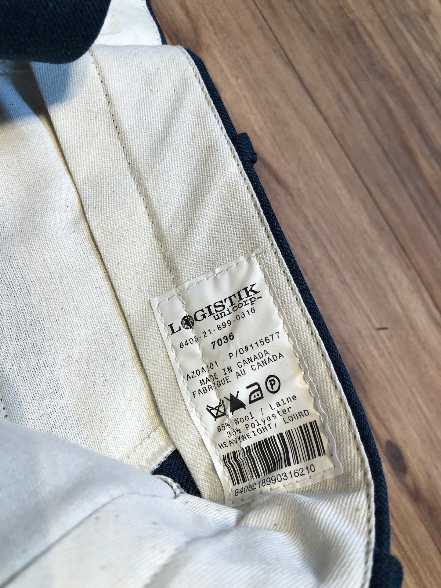 Kingspier Vintage - Logistik blue wool blend (65% wool/ 35% polyester) heavy weight dress pants with zip fly, straight leg, mid rise and front and back pockets,
Made in Canada.