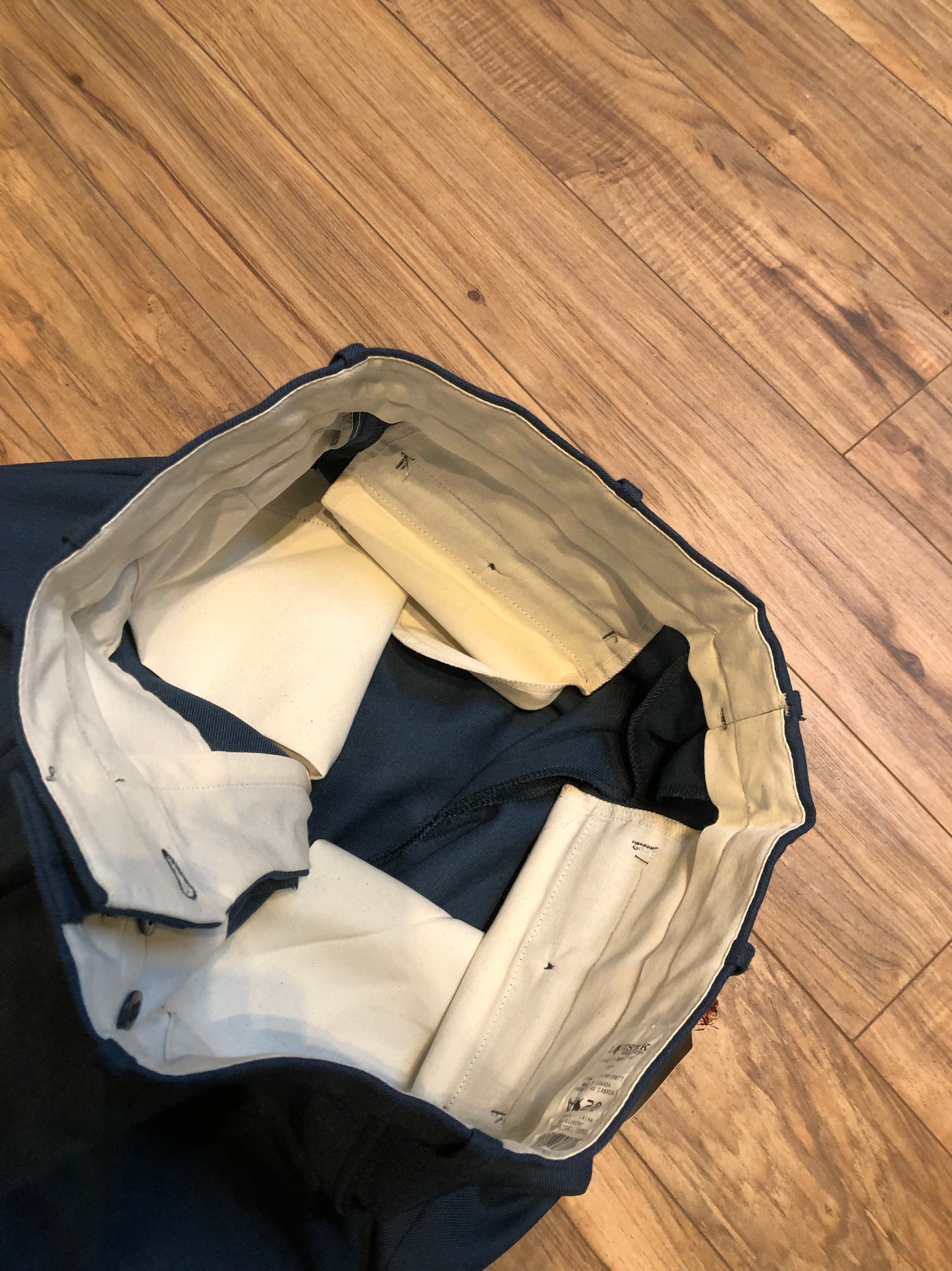 Kingspier Vintage - Logistik blue wool blend (65% wool/ 35% polyester) heavy weight dress pants with zip fly, straight leg, mid rise and front and back pockets,
Made in Canada.