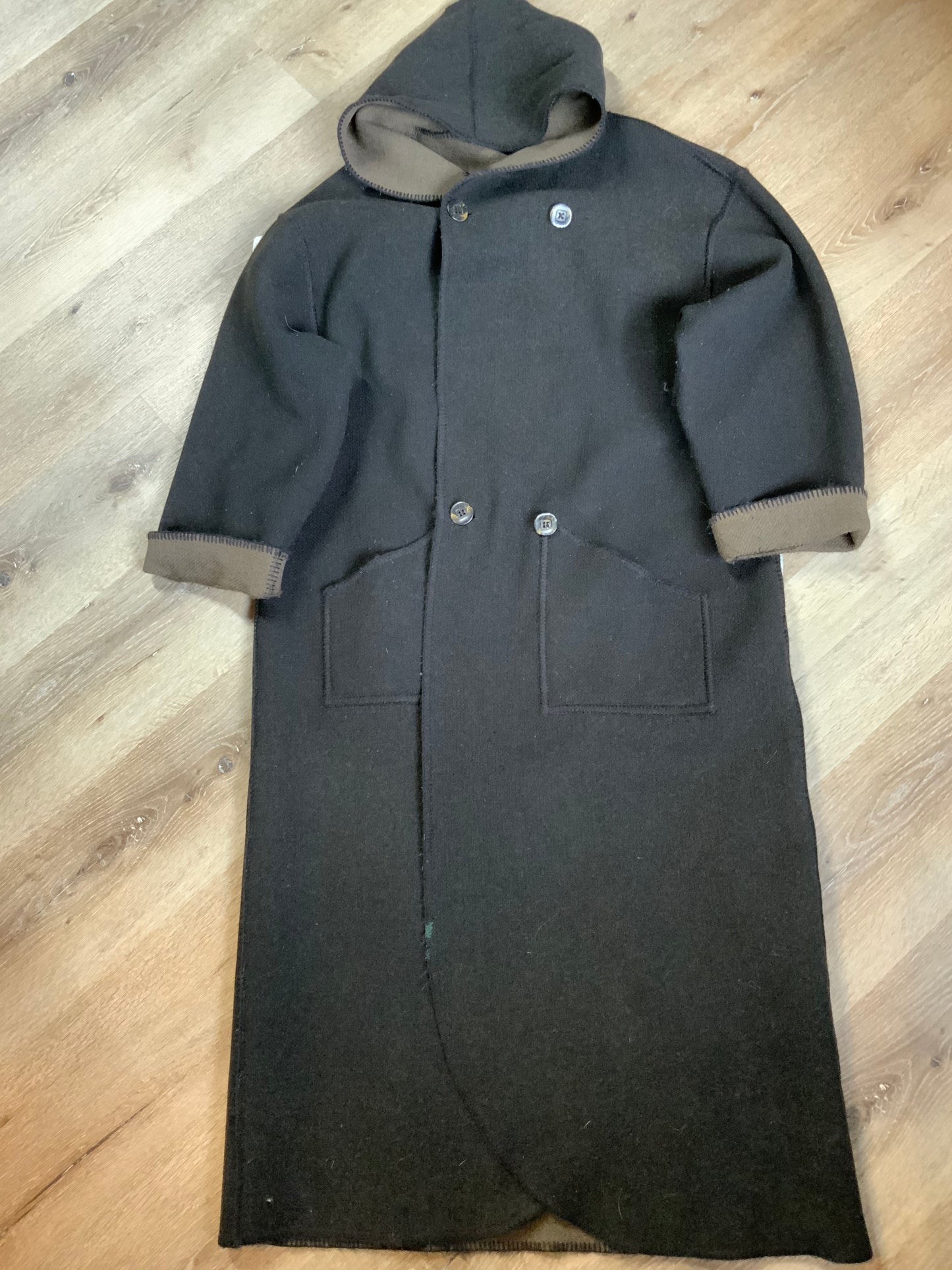Kingspier Vintage - Linda Lundstrom full length black and brown reversible wool coat, double breasted with a hood and pockets on both sides. Made in New Glasgow, Nova Scotia. Size 16.