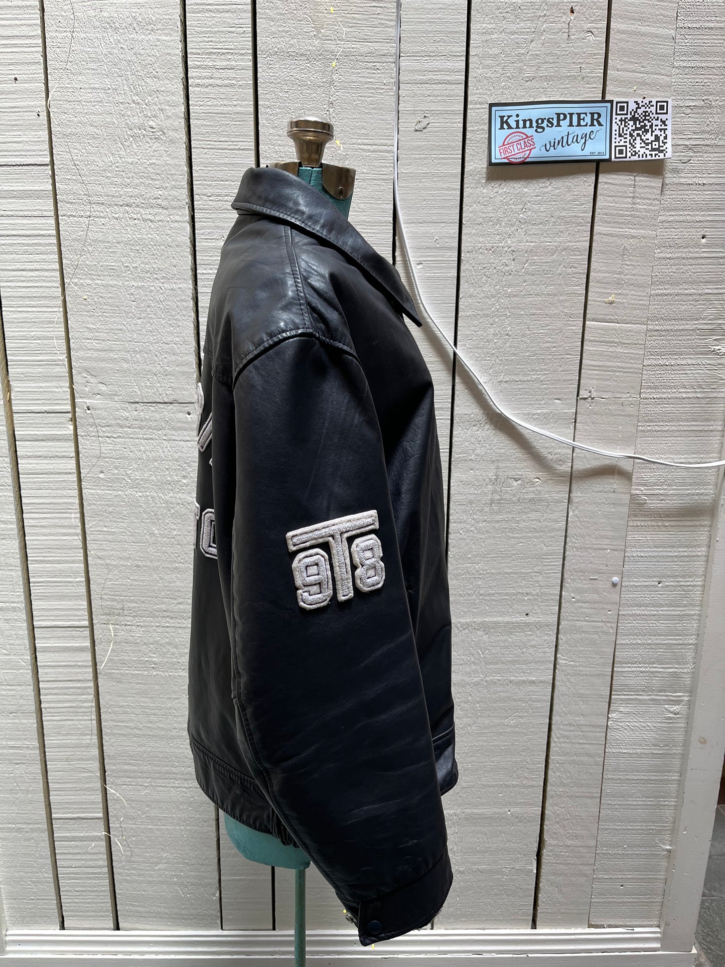 Vintage University of Toronto 1998 English Department Leather Varsity Jacket.
Jacket features embroidered details on the chest, arms and back, two front pockets, zipper and snap closures and a zip out quilted lining.
Size 46.