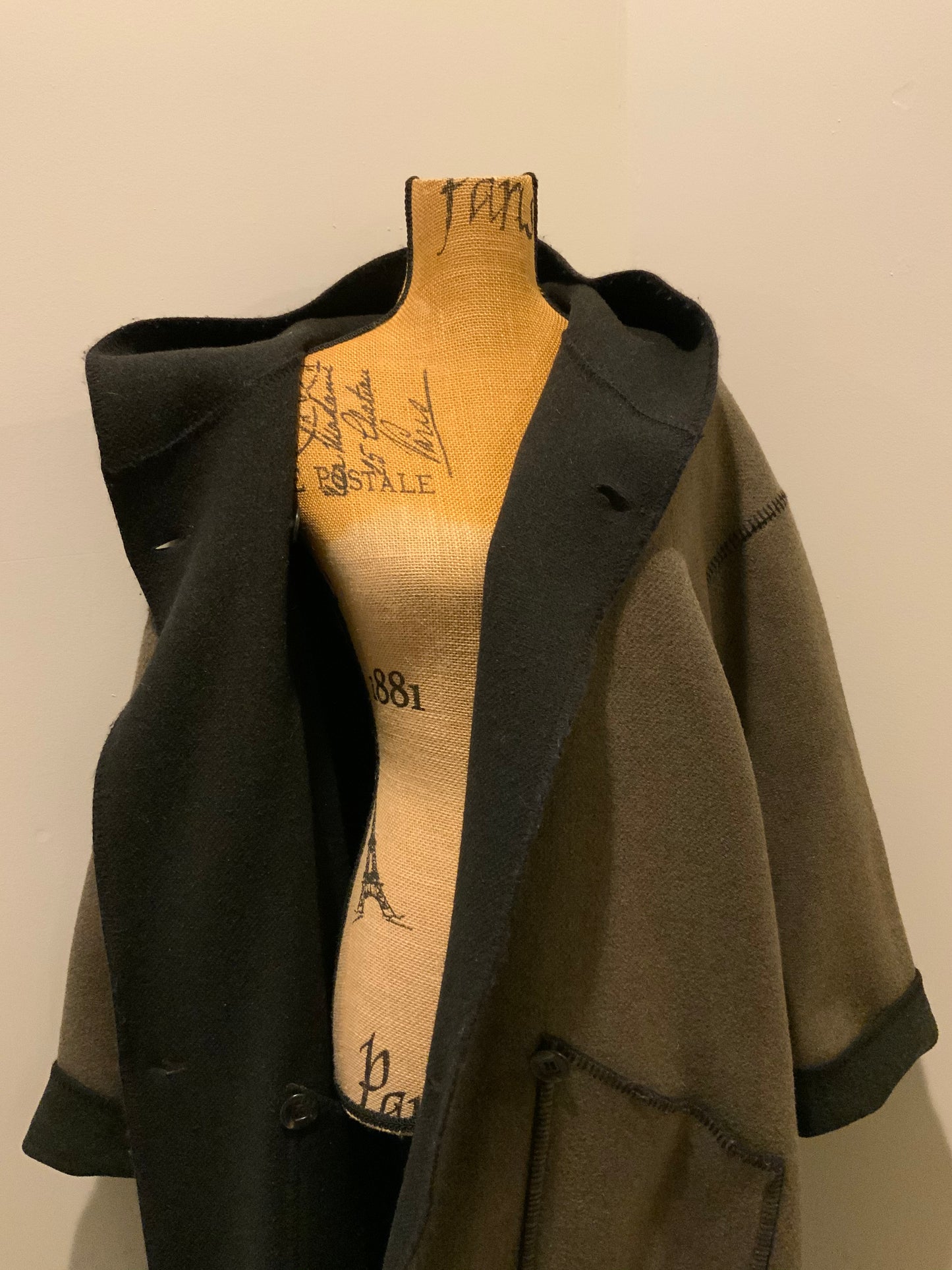 Kingspier Vintage - Linda Lundstrom full length black and brown reversible wool coat, double breasted with a hood and pockets on both sides. Made in New Glasgow, Nova Scotia. Size 16.