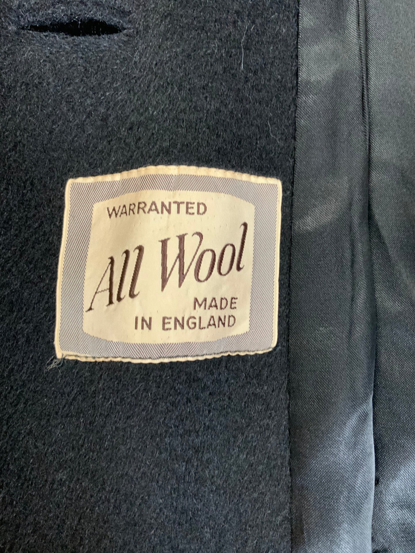 Kingspier Vintage - All Wool Full length black soft wool coat with button closures and front pockets. Made in England.