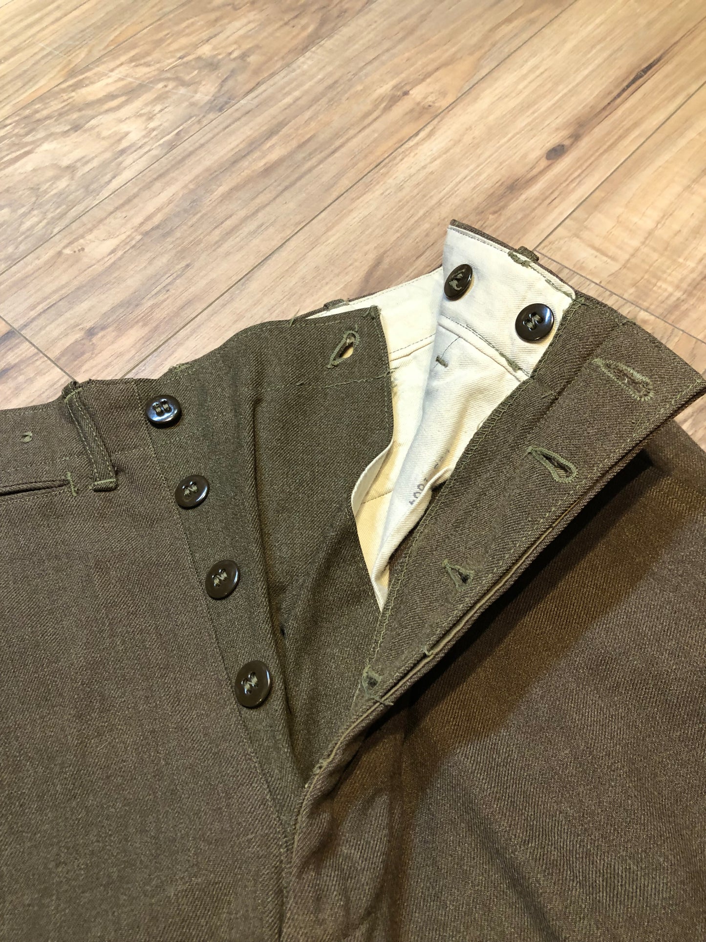 Kingspier Vintage - Vintage 1945 US Army Issue Wool Field Trousers with button fly, straight leg and front and back pockets.
Made in USA.
