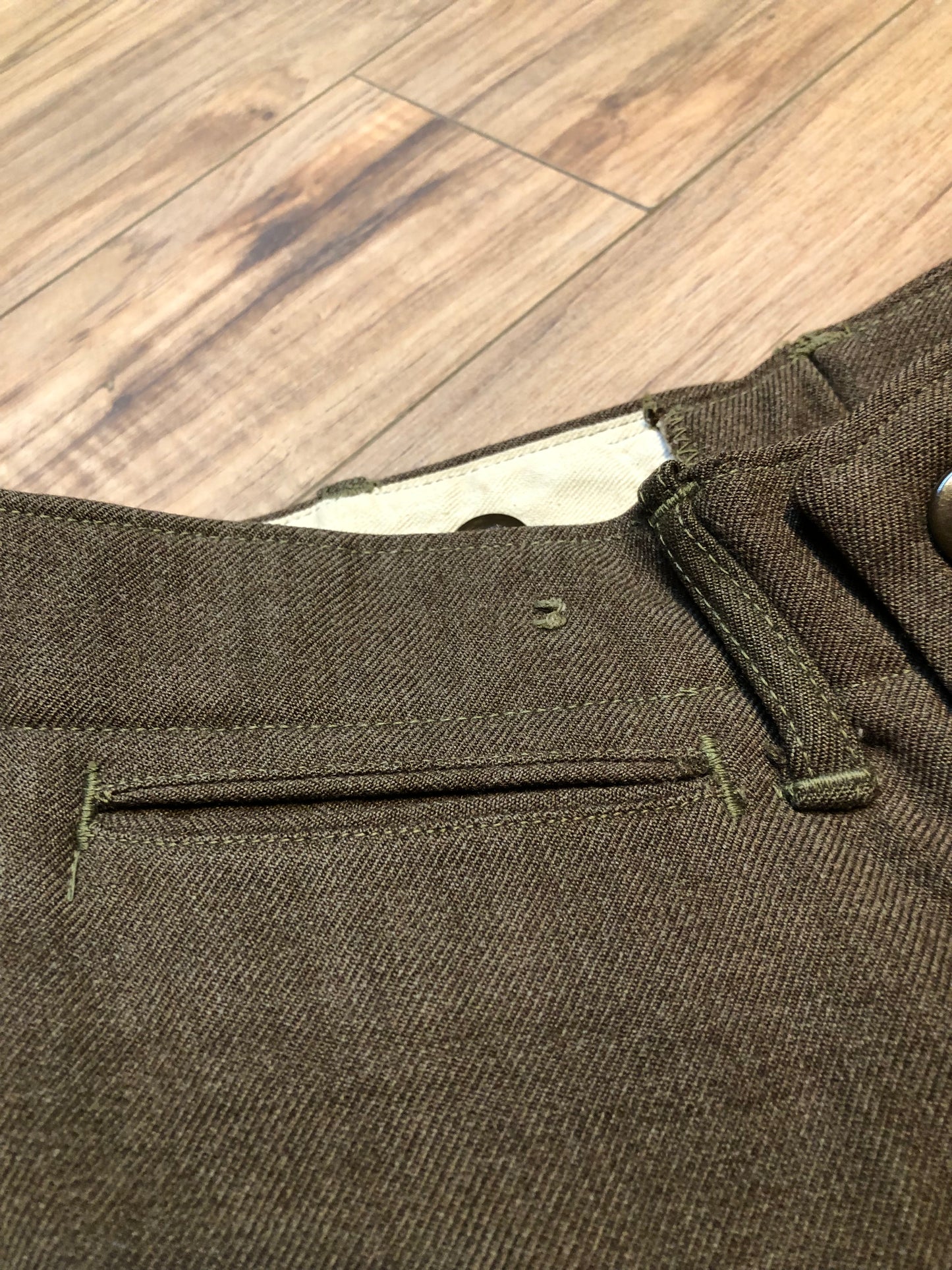 Kingspier Vintage - Vintage 1945 US Army Issue Wool Field Trousers with button fly, straight leg and front and back pockets.
Made in USA.