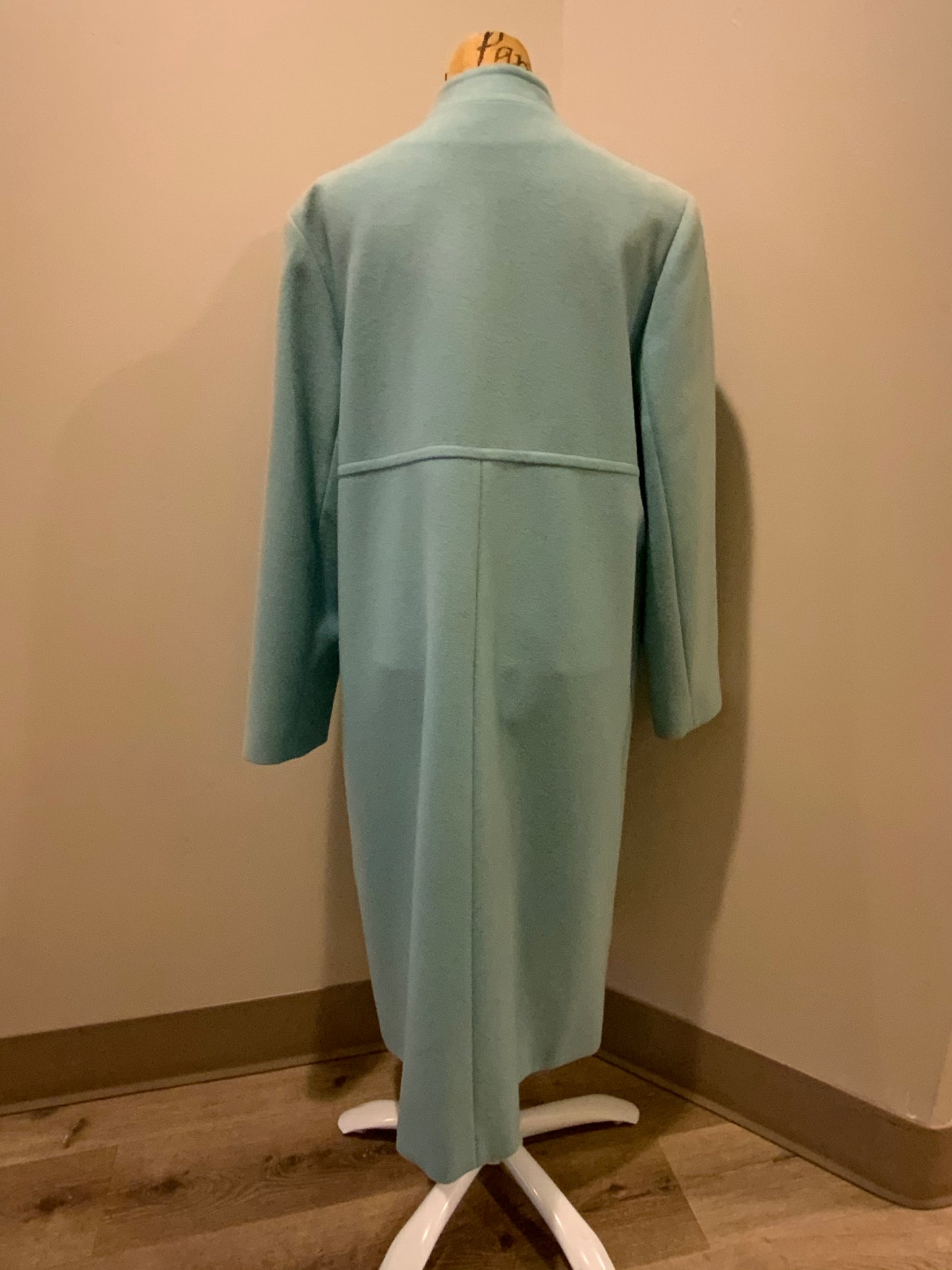 Kingspier Vintage - Harve Benard by Benard Holtzman light blue wool blend double breasted coat with two lovely brown front button closures and flat front pockets. Lining is off white with a fun hot pink trim. Made in Balarus. Size 16 but fits small.