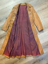 Load image into Gallery viewer, Kingspier Vintage - Trojan Fine Leather Sportswear 1970’s belted light brown leather jacket with buttons down the front and pockets. Made in Toronto.
