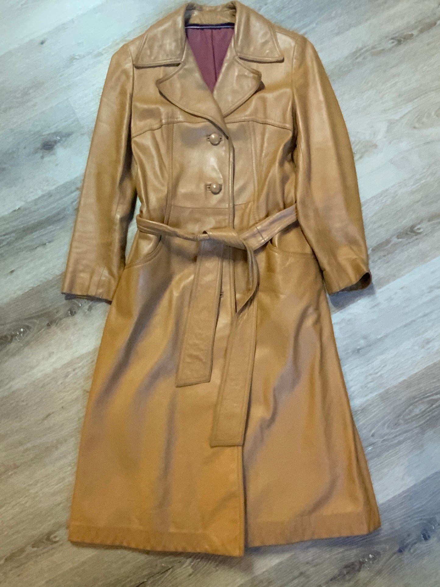 Kingspier Vintage - Trojan Fine Leather Sportswear 1970’s belted light brown leather jacket with buttons down the front and pockets. Made in Toronto.