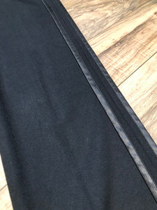 Kingspier Vintage - Club Monaco black wool blend (98% wool/ 2% spandex ) tuxedo pants with a double stripe down the sides, zip fly, low rise, slim cut and front and back pockets. 

Size 0.