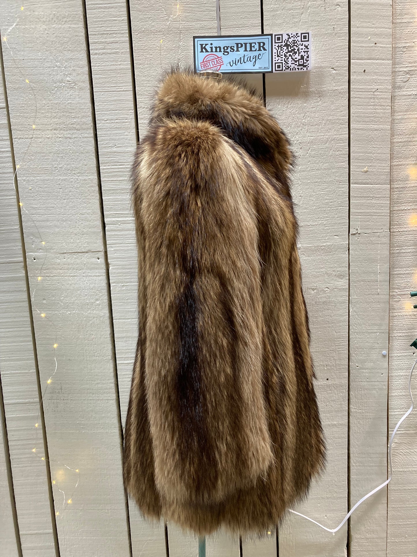 Kingspier Vintage - Vintage Greenwich Furs light brown fur coat with hook and eye closures and two front pockets.
Made in USA