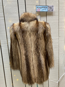 Kingspier Vintage - Vintage Greenwich Furs light brown fur coat with hook and eye closures and two front pockets.

Made in USA