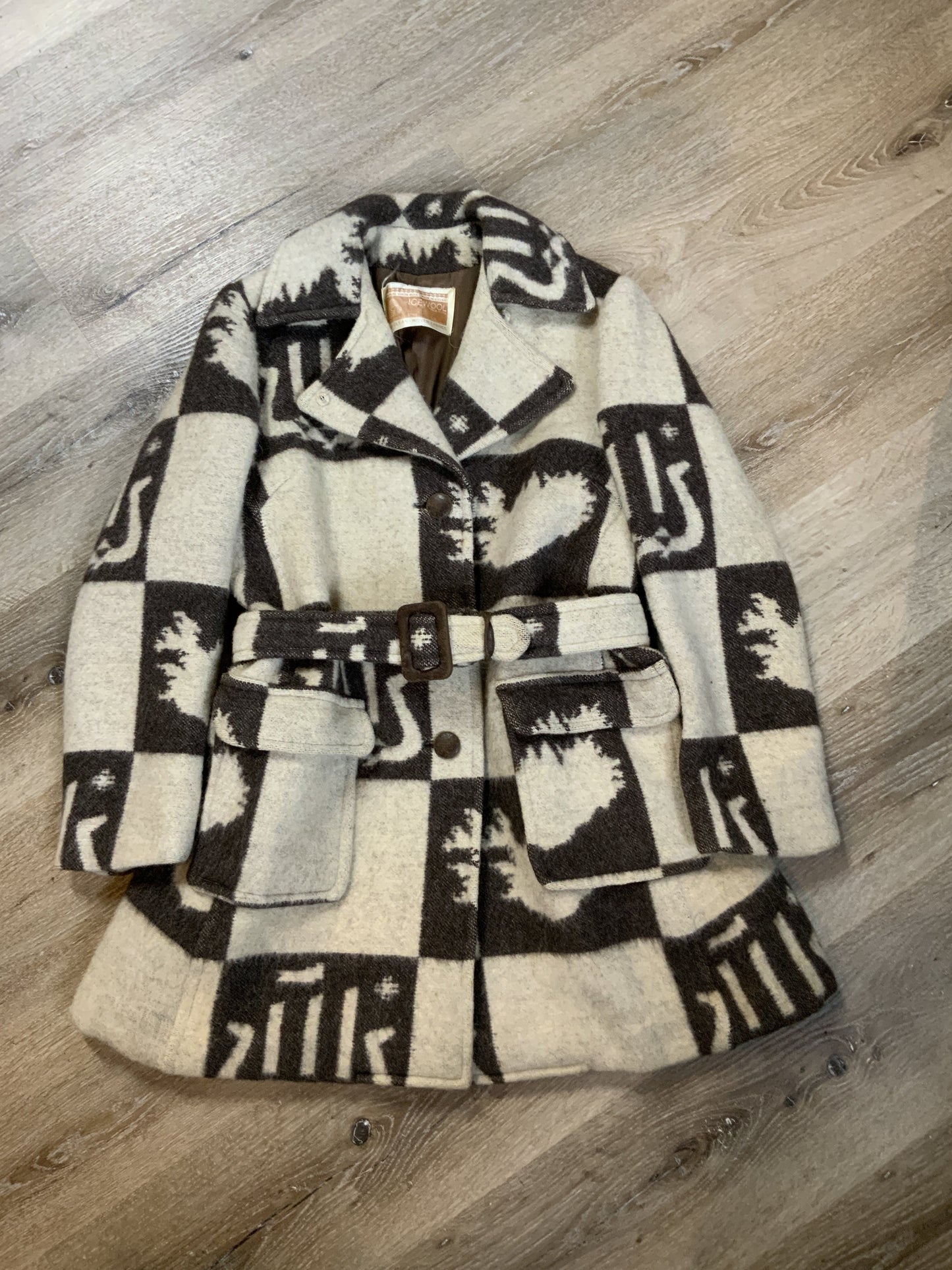 Kingspier Vintage - Icewool 100% pure virgin wool coat. Brown and cream pattern with belt, wooden buttons and a top snap closure. Made in Iceland. Fits size 14.