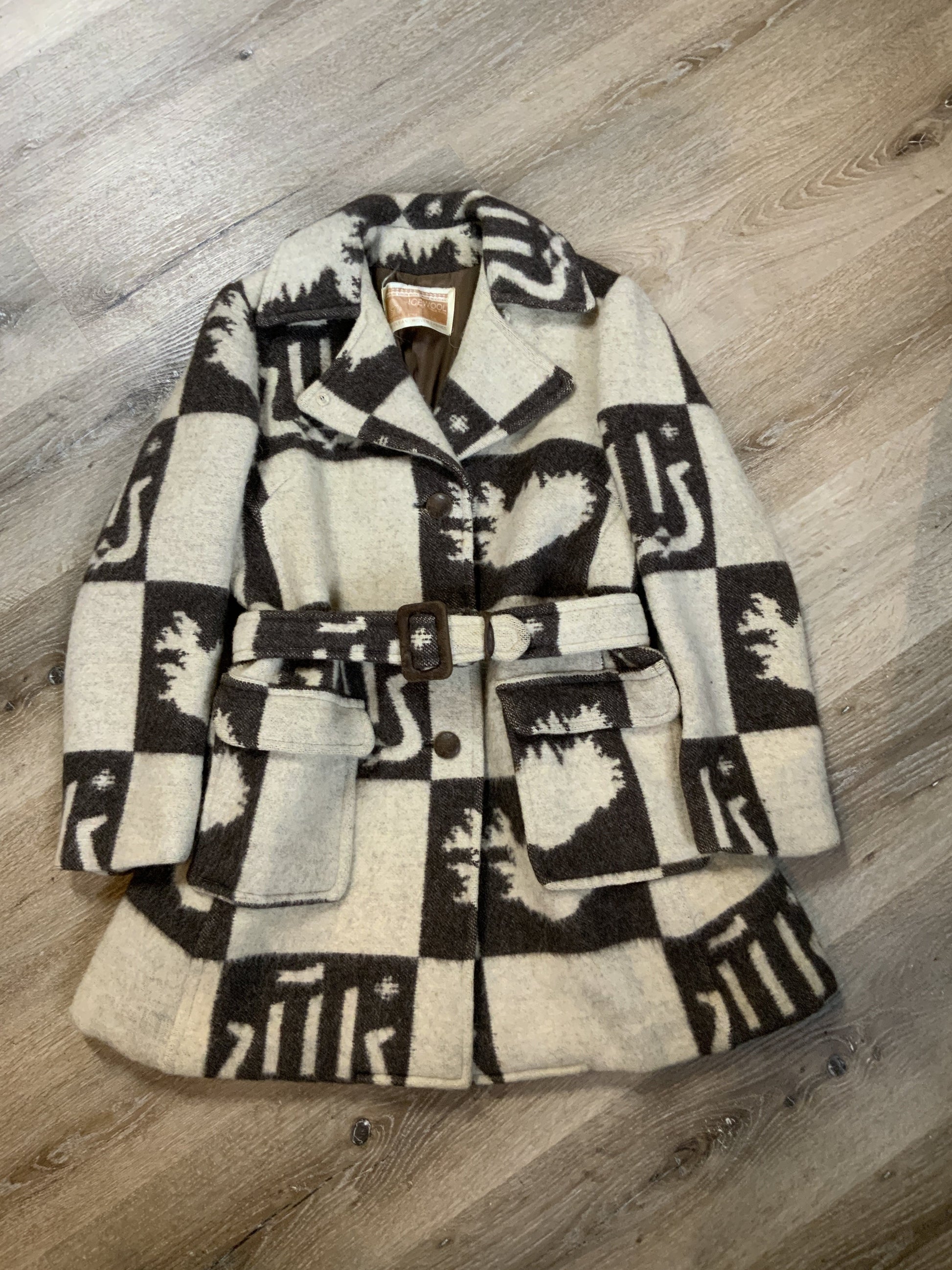 Kingspier Vintage - Icewool 100% pure virgin wool coat. Brown and cream pattern with belt, wooden buttons and a top snap closure. Made in Iceland. Fits size 14.