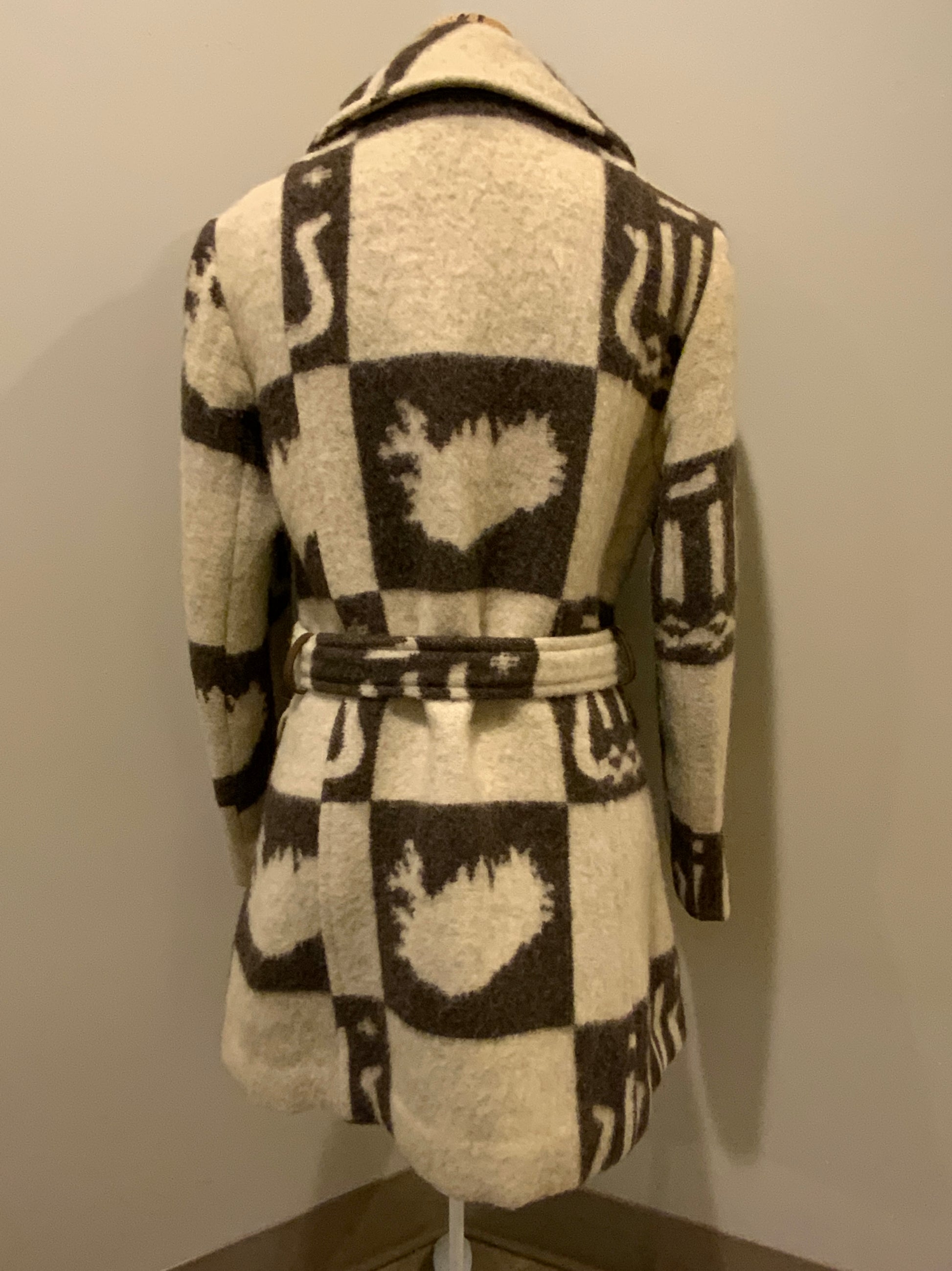 Kingspier Vintage - Icewool 100% pure virgin wool coat. Brown and cream pattern with belt, wooden buttons and a top snap closure. Made in Iceland. Fits size 14.