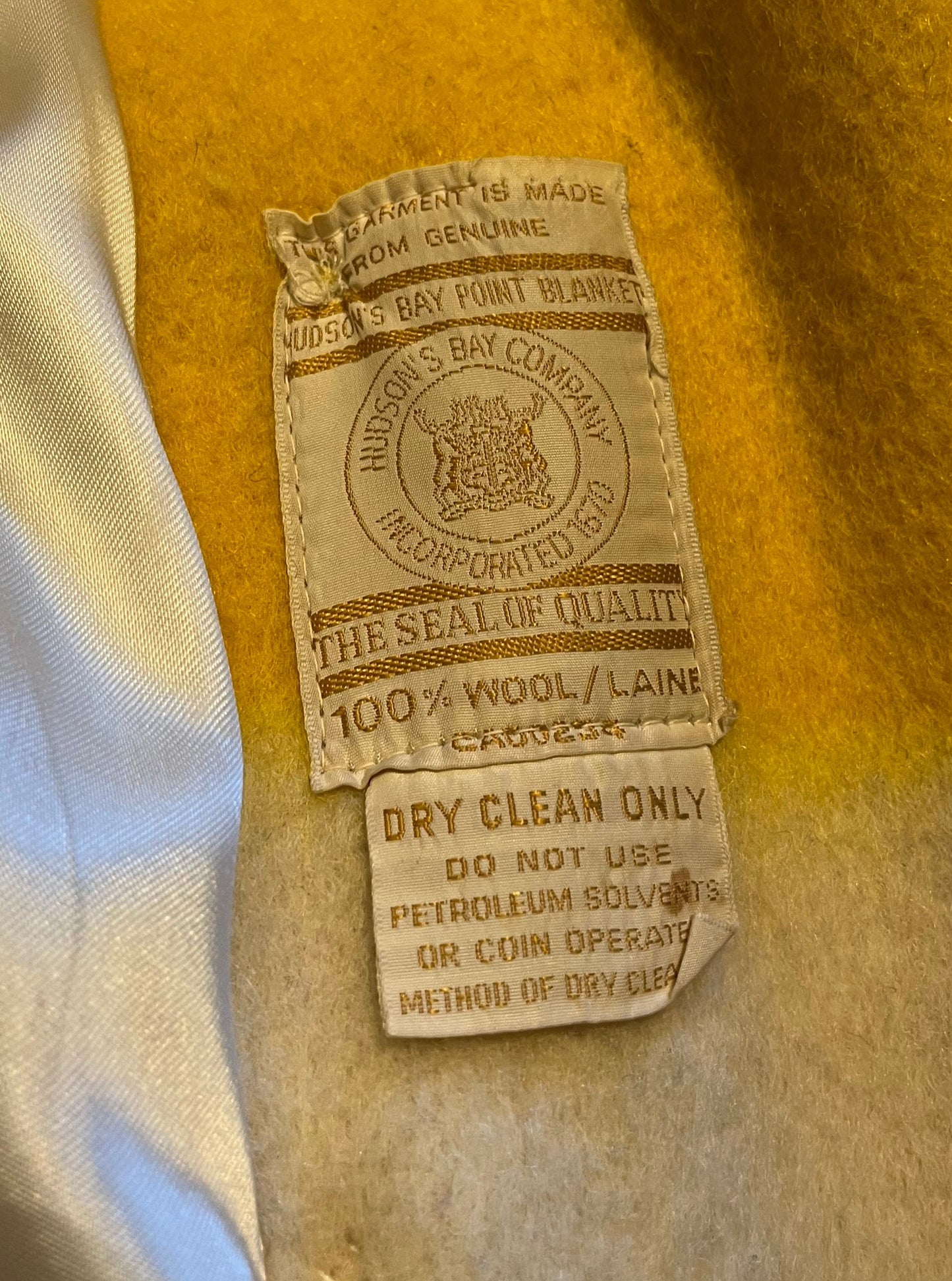 Genuine Hudson’s Bay Company 100% wool point blanket coat in the iconic multi-stripe colours. The coat is double breasted with pockets and a satin lining.
Union made in Canada.
Chest measures 42”.