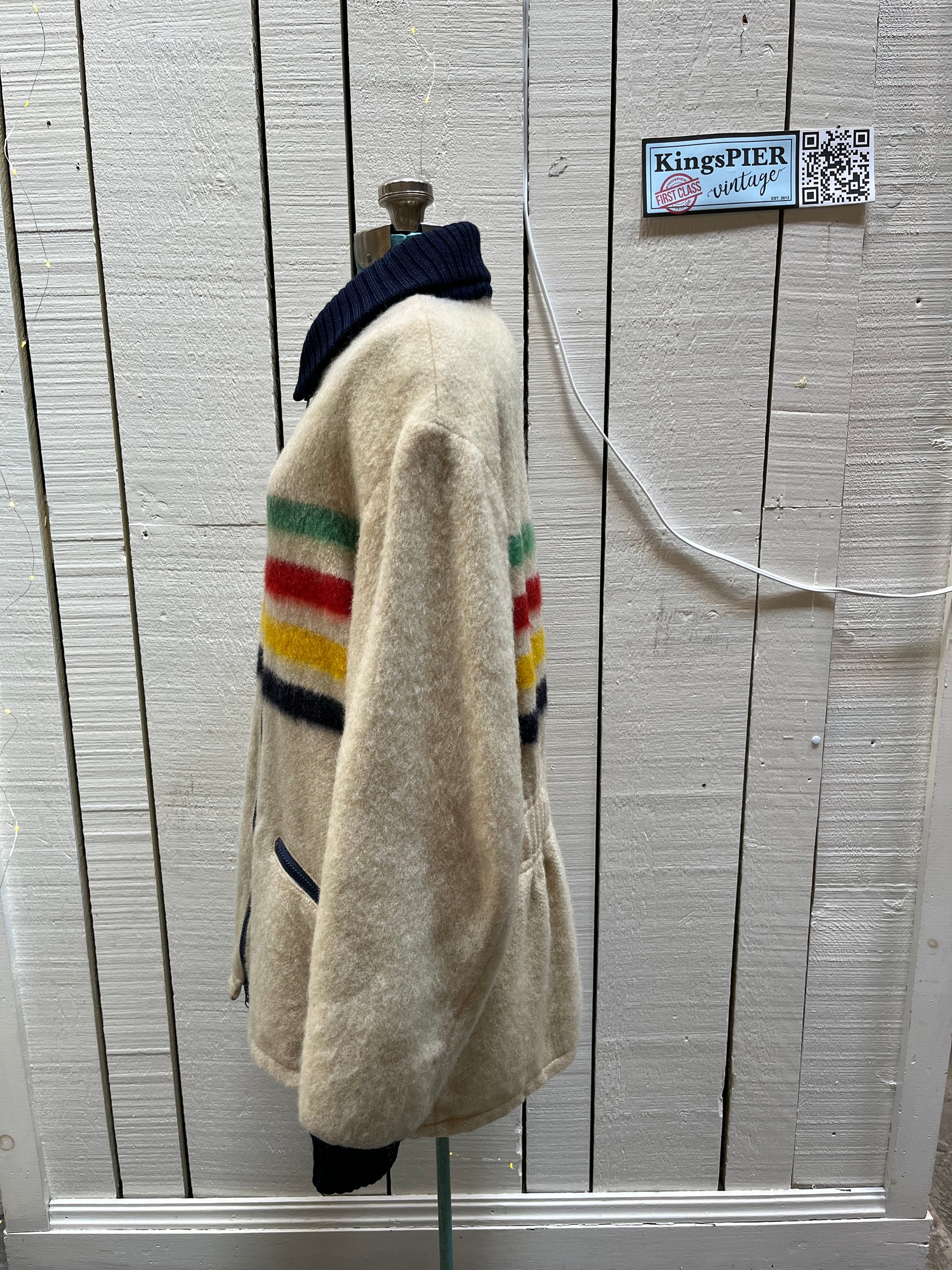 Genuine Hudson’s Bay Company 100% wool point blanket zip cardigan in the iconic multi-stripe colours with two zip front pockets.
Union made in Canada. 
Size medium.