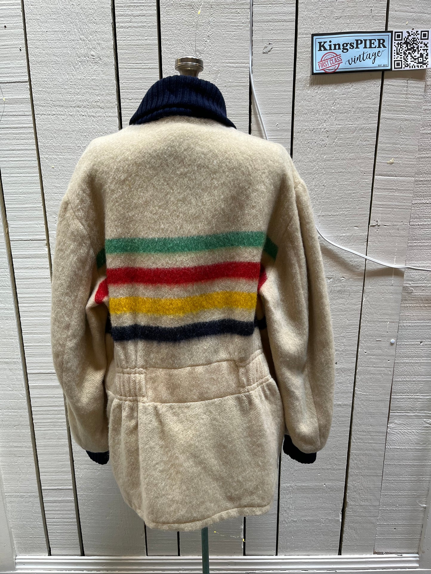 Genuine Hudson’s Bay Company 100% wool point blanket zip cardigan in the iconic multi-stripe colours with two zip front pockets.
Union made in Canada.
Size medium.