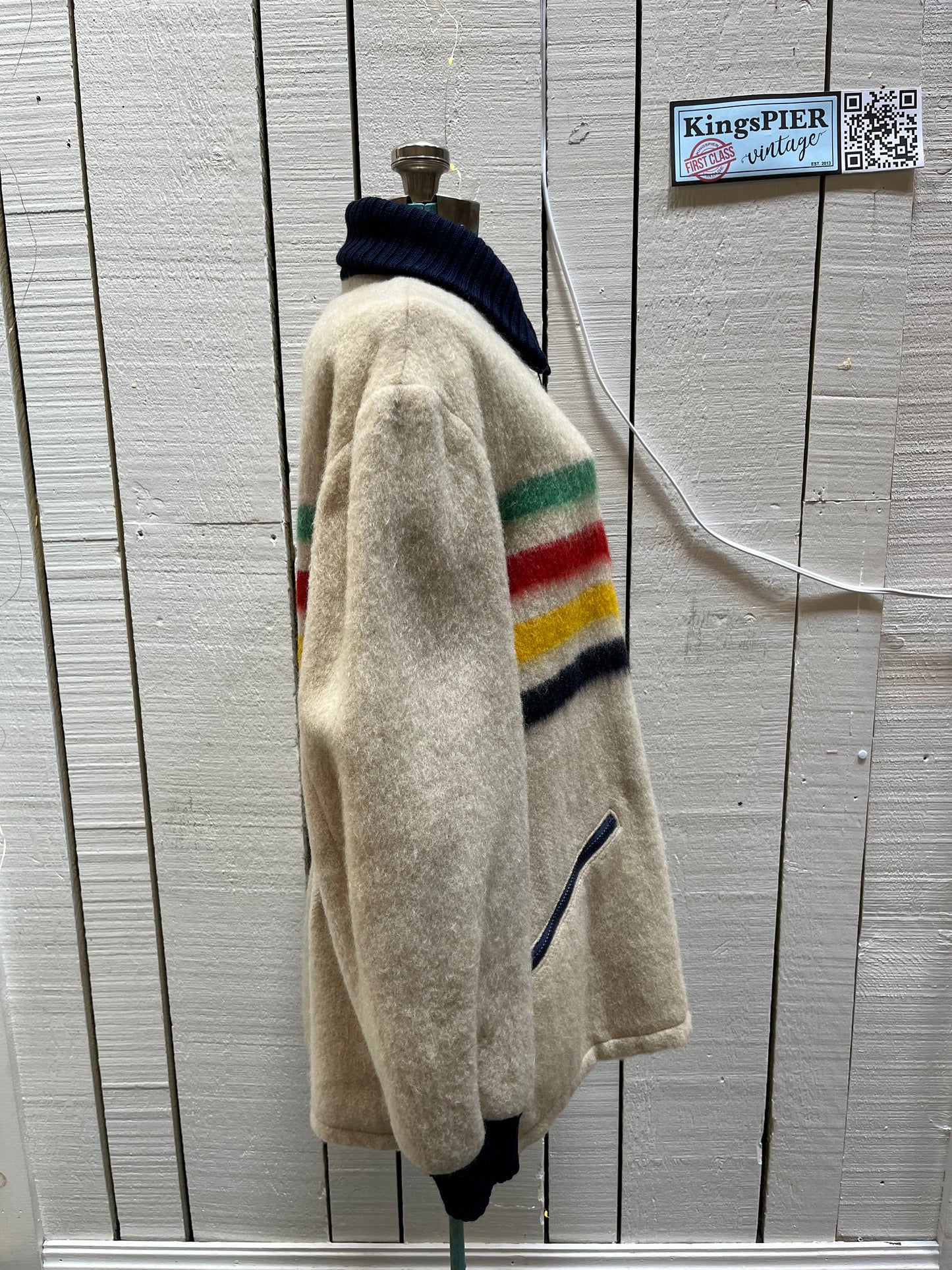 Genuine Hudson’s Bay Company 100% wool point blanket zip cardigan in the iconic multi-stripe colours with two zip front pockets.
Union made in Canada.
Size medium.