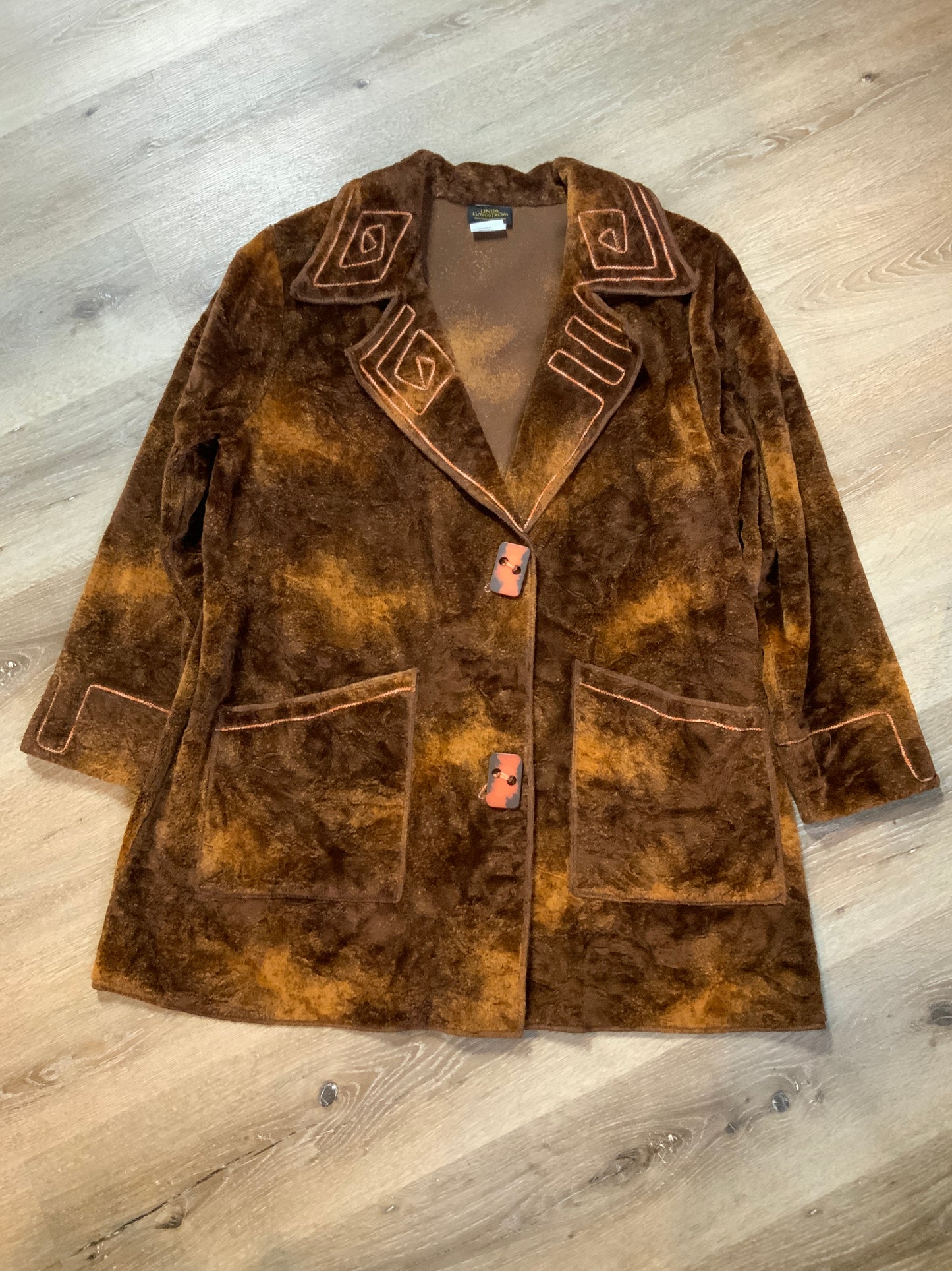 Kingspier Vintage - Linda Lundstrom brown synthetic wool sweater-style coat with geometric design on collar and cuffs, large funky buttons and patch pockets. Made in Canada. Fits a size 14.