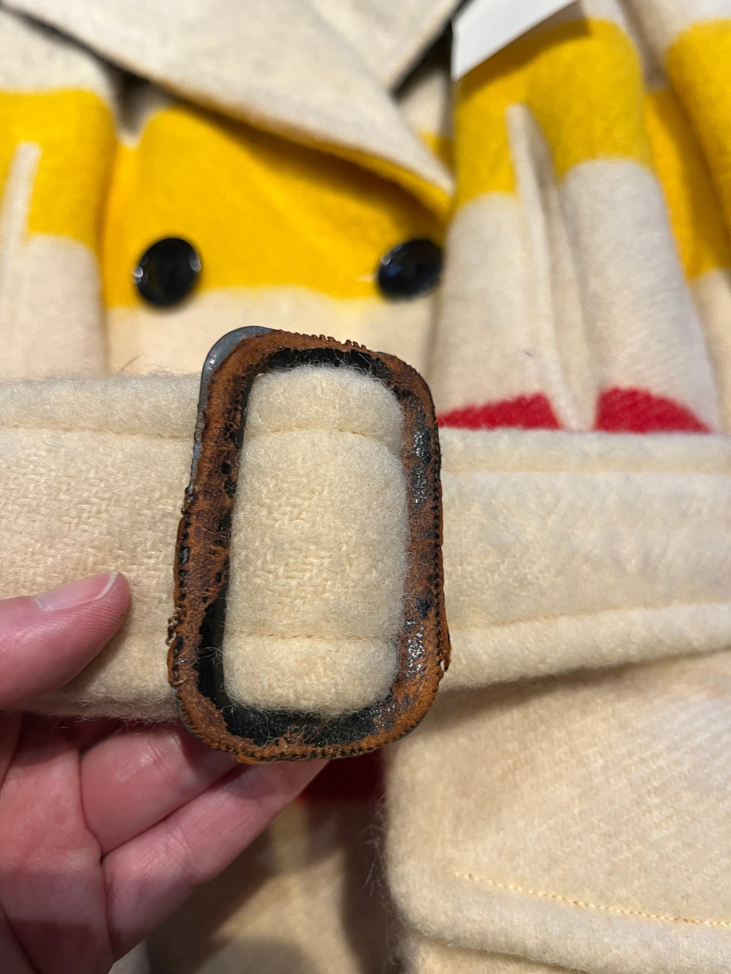 Genuine 1960’s Hudson’s Bay Company 100% wool point blanket coat in the iconic multi-stripe colours. The coat features flap pockets and hand warmer pockets, double breasted button closures and belt.
Made in Canada.
Chest 40”