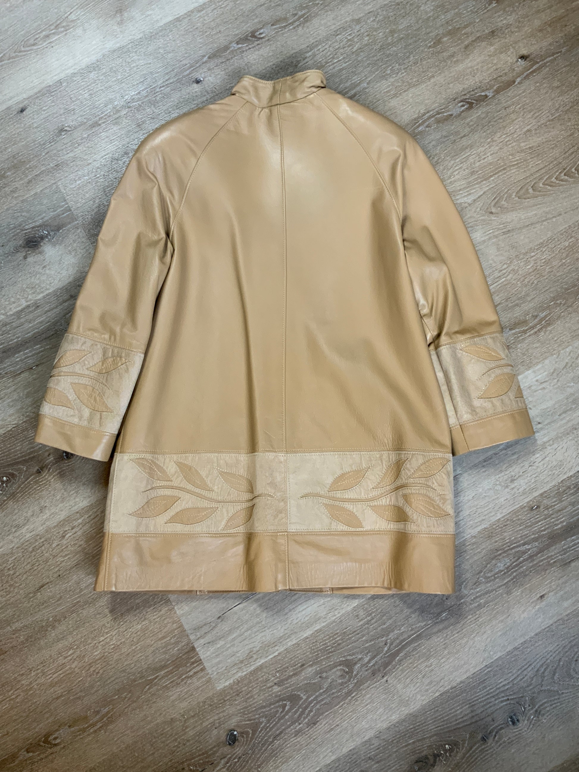 Kingspier Vintage - Les Fourrures Lord Inc beige coloured leather car coat with suede leaf motif at cuffs and hem, suede buttons and patch pockets.