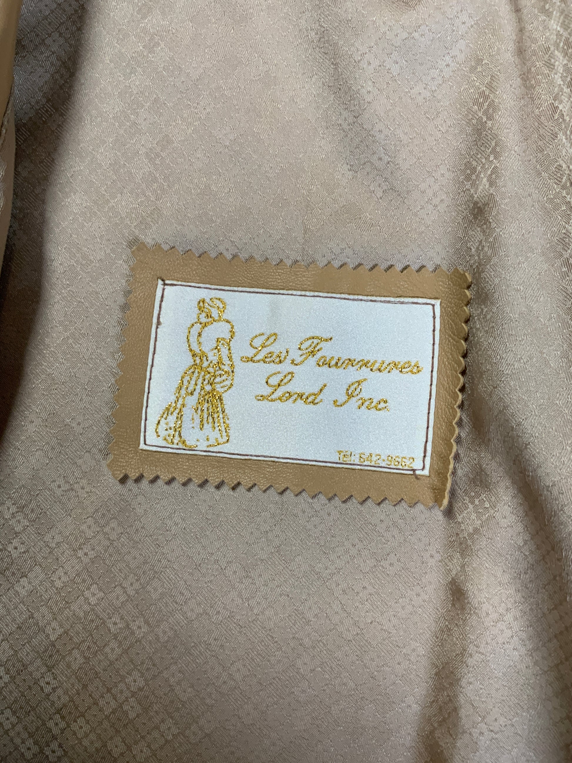 Kingspier Vintage - Les Fourrures Lord Inc beige coloured leather car coat with suede leaf motif at cuffs and hem, suede buttons and patch pockets.