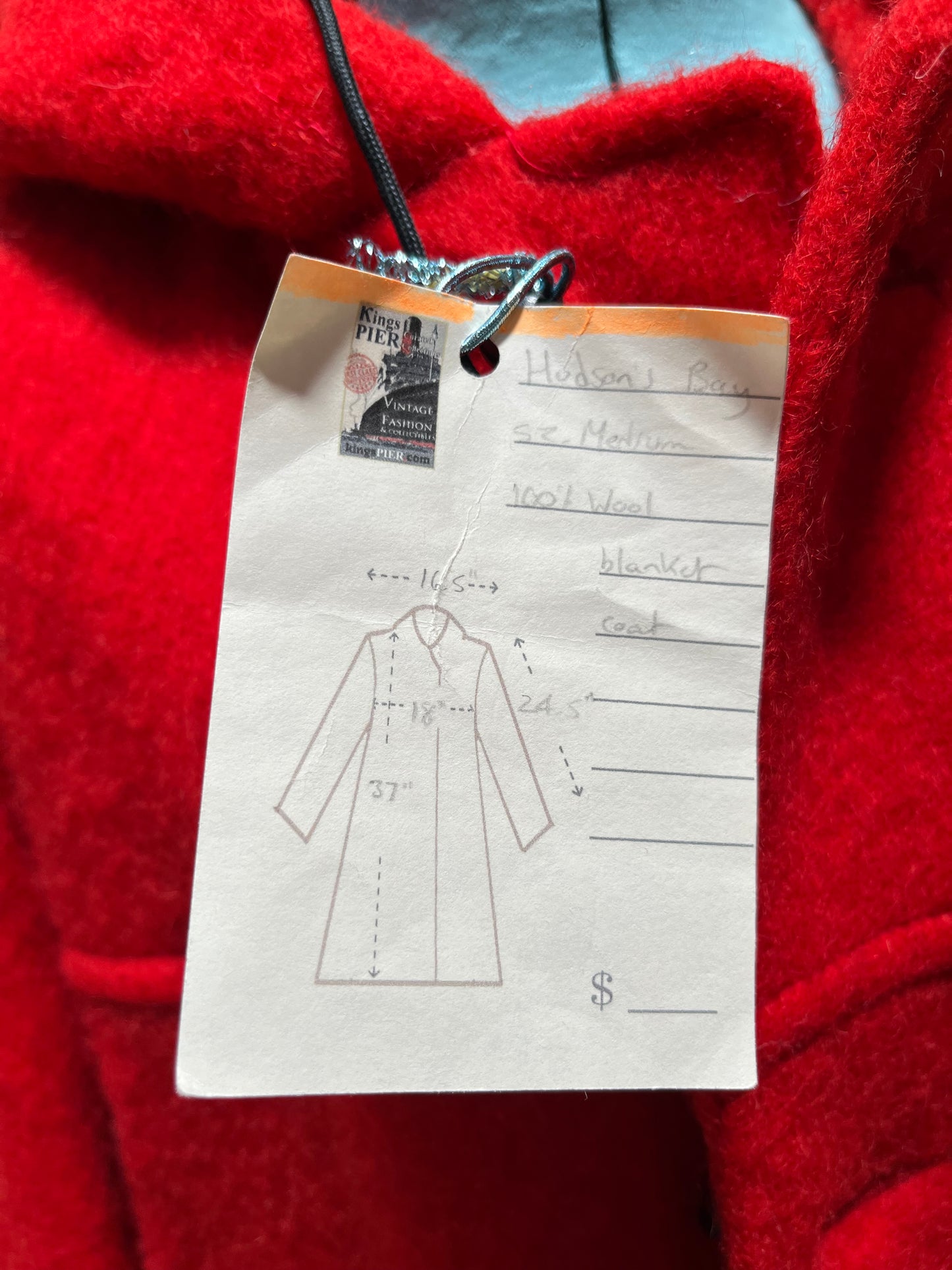 Genuine Hudson’s Bay Company 100% wool point blanket coat in bright red. The coat features flap pockets and hand warmer pockets, leather buttons, zip closure and a hood.
Made in Canada.
Size medium.