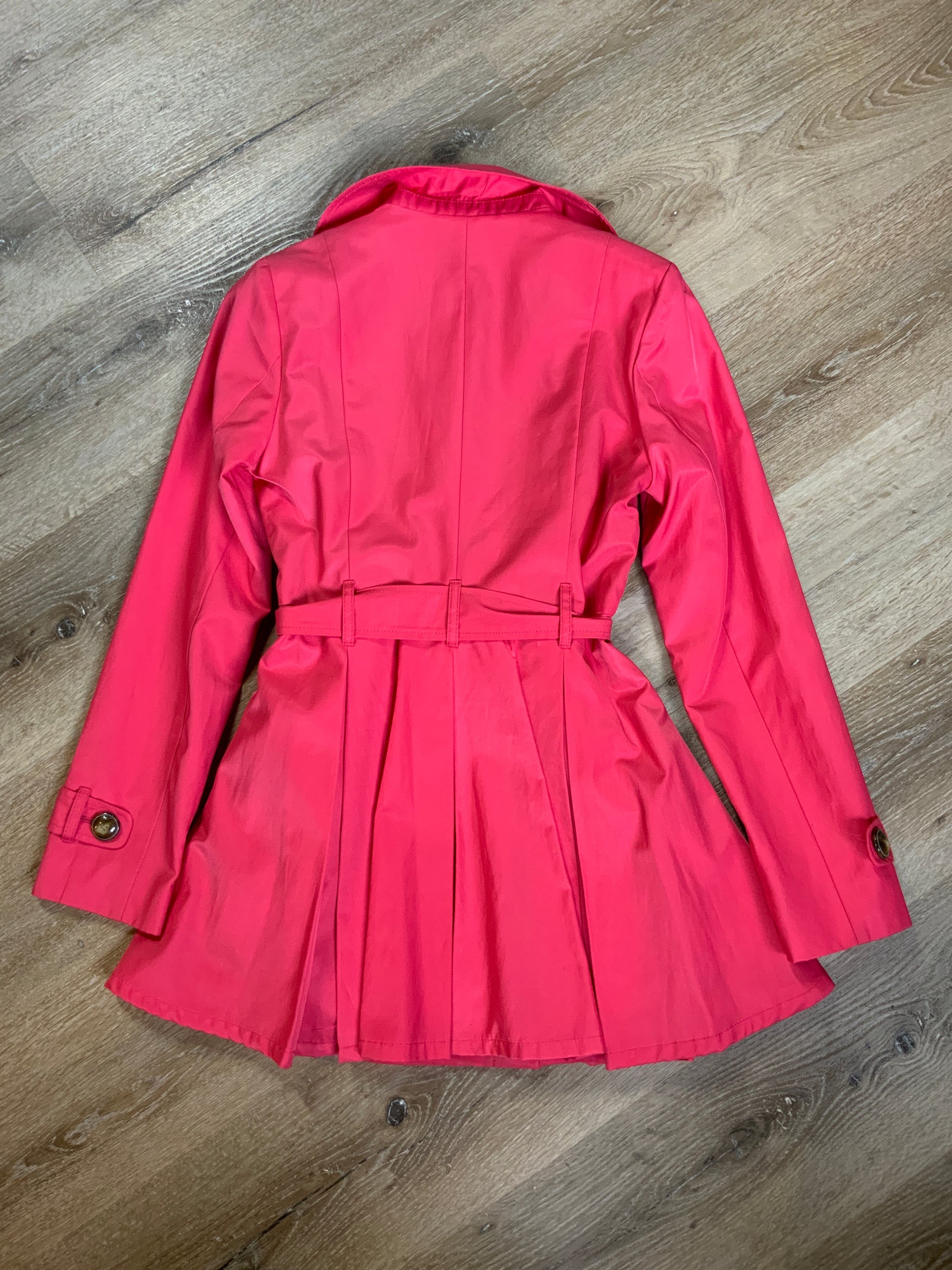 Kingspier Vintage - Black Rivet bright pink double breasted trench coat with belt, welt pockets, pleated skirt and vibrant flower motif lining. Size small.