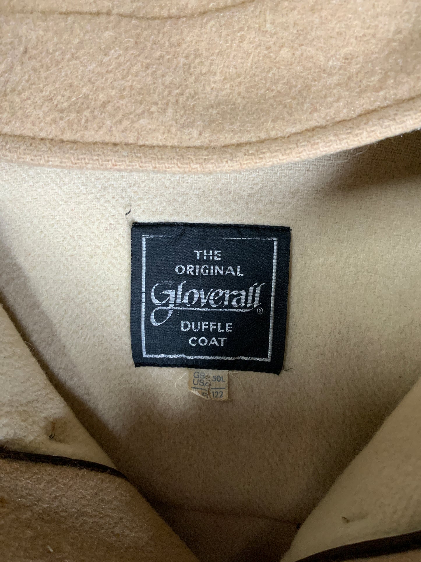 Kingspier Vintage - Gloverall tan wool duffle coat with hood, zipper, wooden toggles and flap pockets. Made in England. Size 50L.
