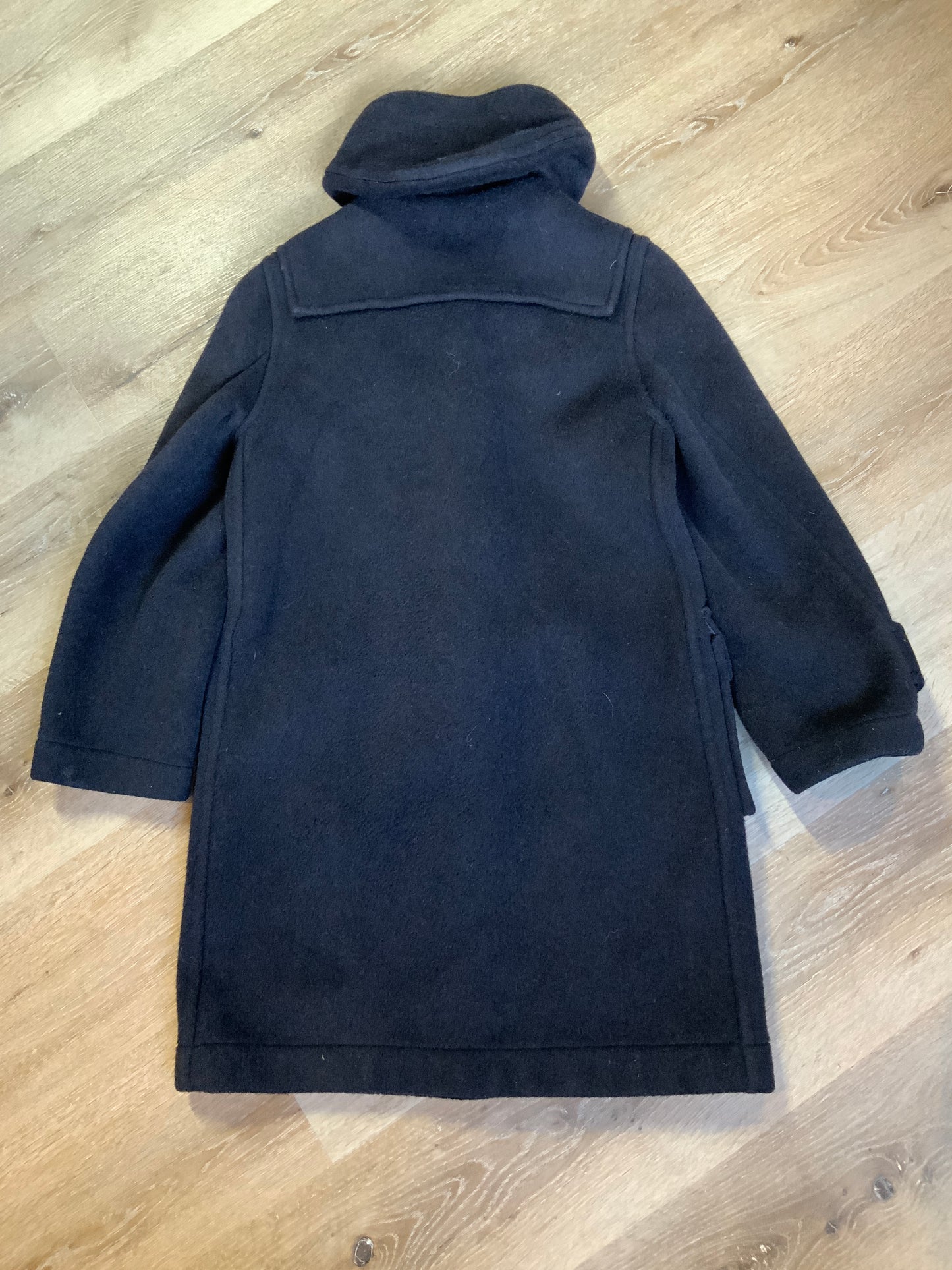 Kingspier Vintage - Gloverall navy blue wool duffle coat with hood, zipper, wooden toggles, flap pockets and green plaid lining. Made in England.