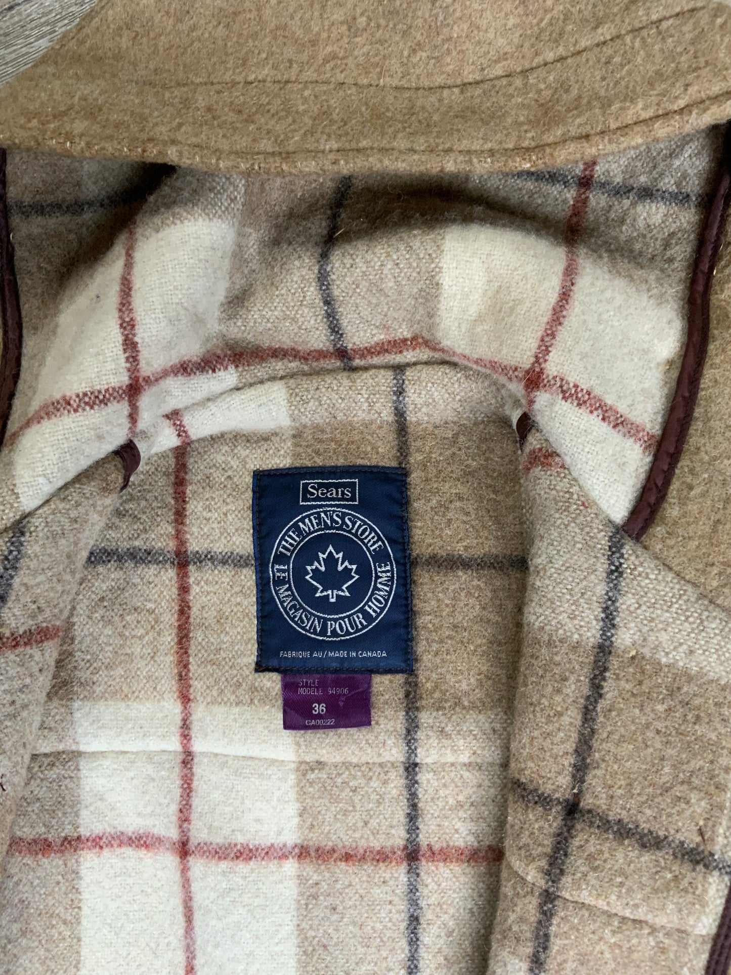 Kingspier Vintage - Sears textured beige wool blend duffle coat with hood, zipper, wooden toggles, flap pockets and tartan lining. Made in Canada. Size 36.