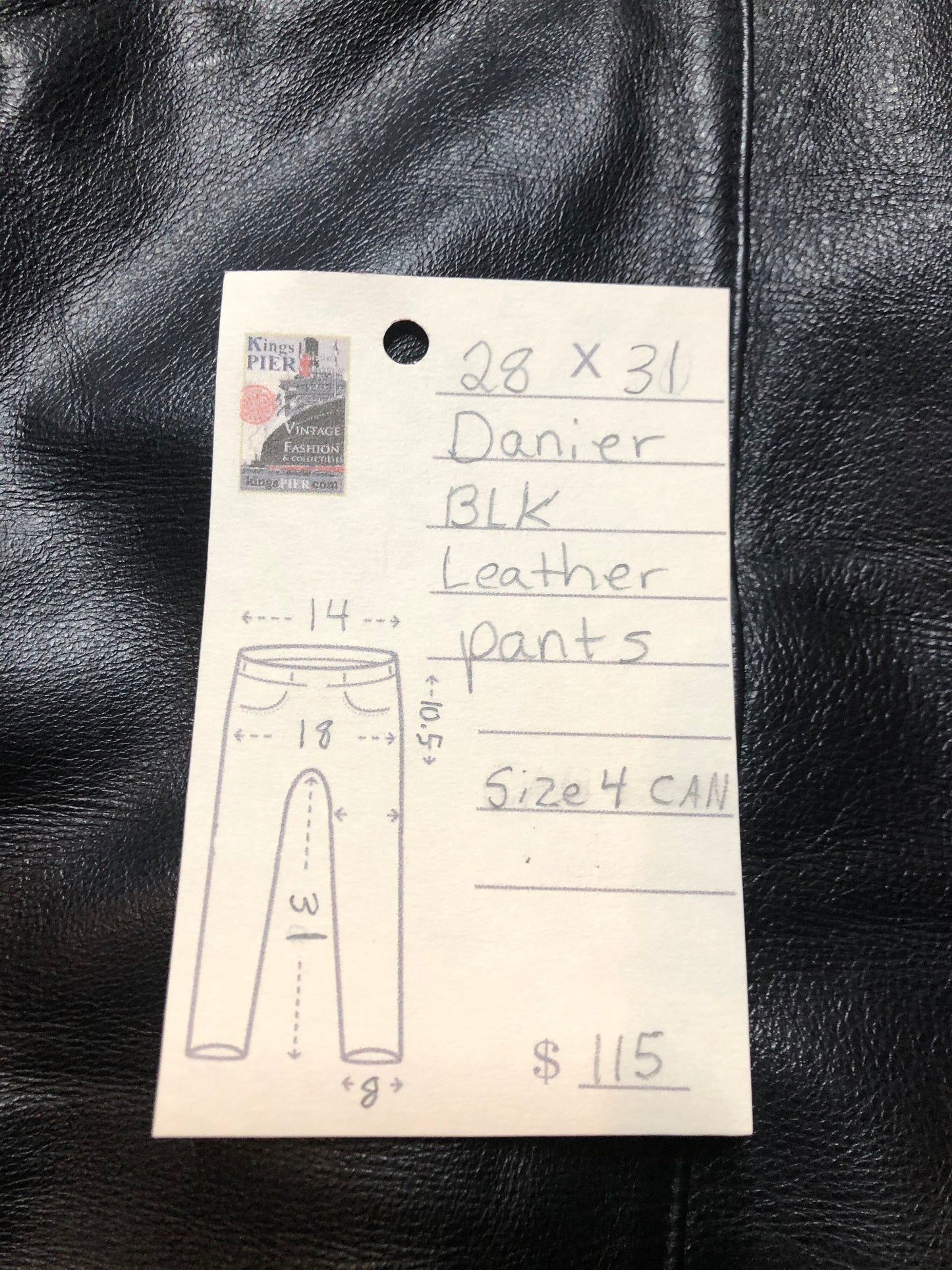Danier black leather straight leg pants with side zip closure, partially lined. Size 4 Canadian (28x31).
