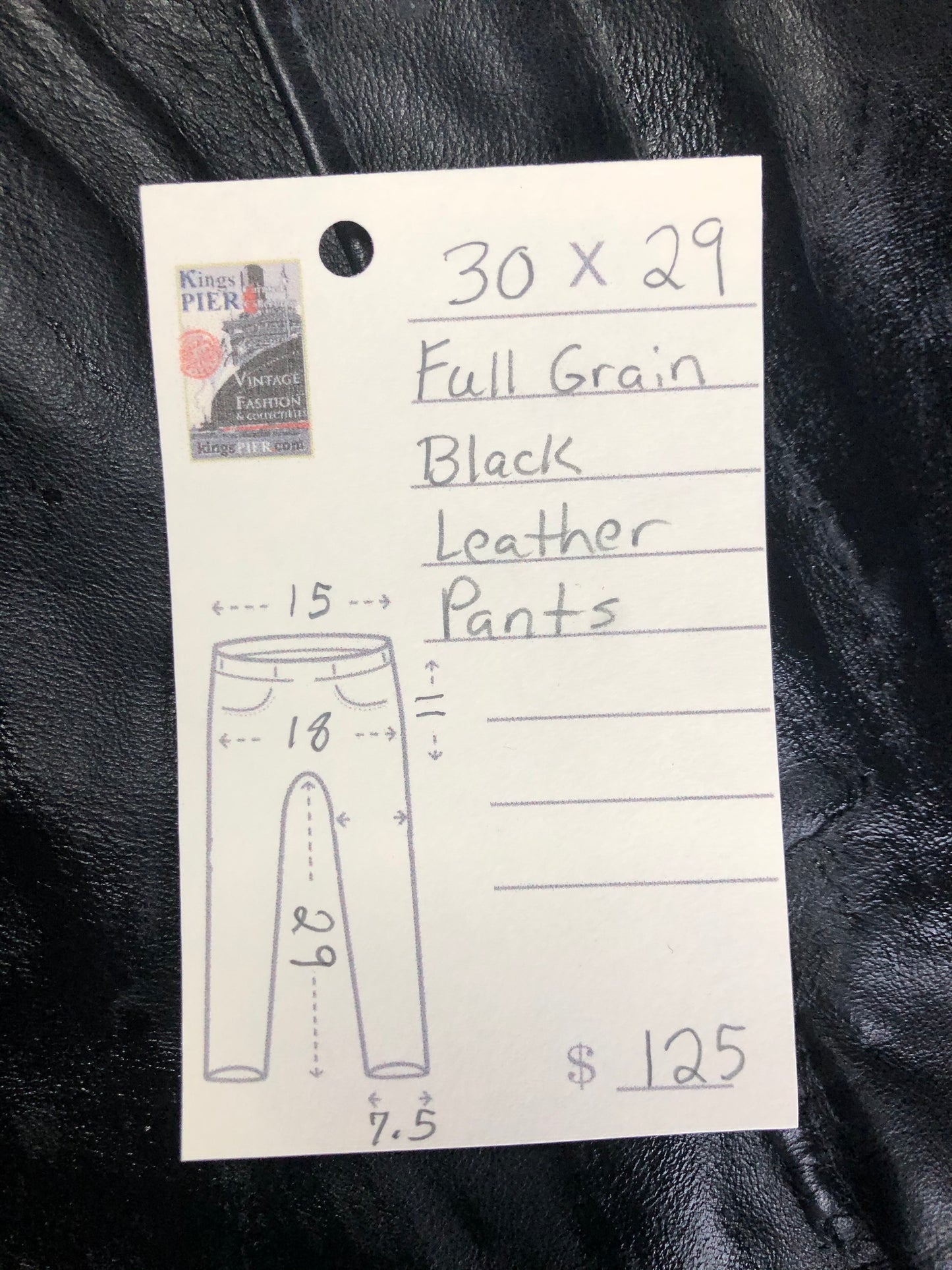 Vintage black full grain leather straight leg pants with zip and snap closure, pockets in the front and back. Size 30x29.