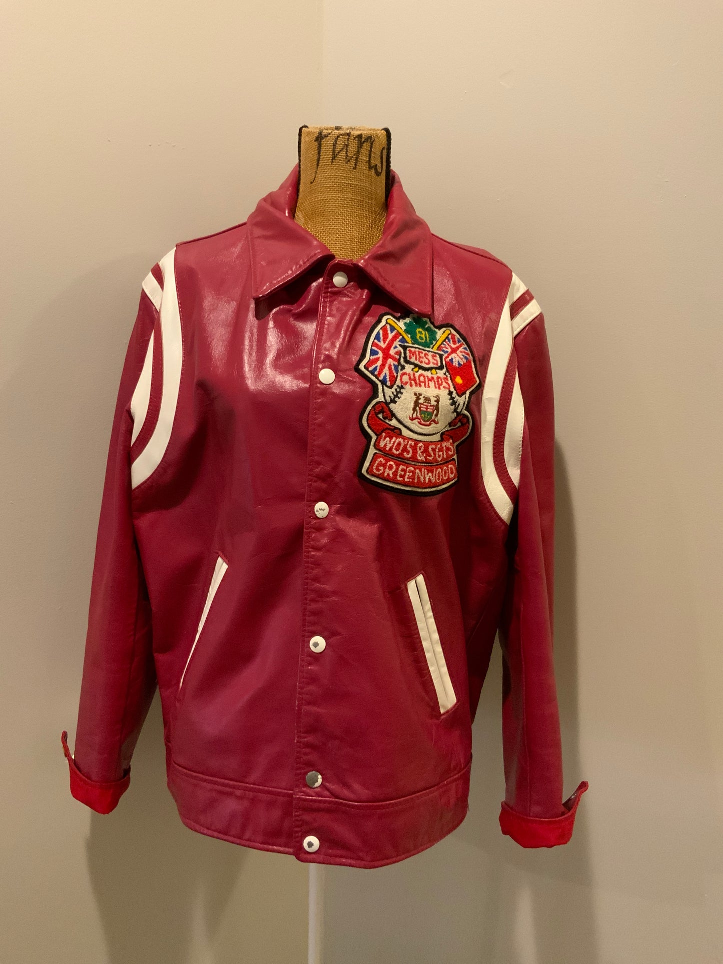 Kingspier Vintage - Mess Champs (Greenwood) Baseball red letterman’s jacket with white stripes , embroidered emblem on chest, snap closures and slash pockets. Size 42.